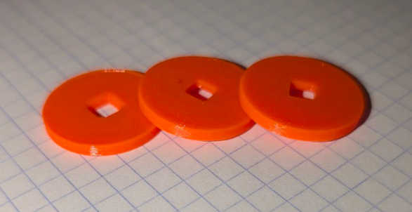 Coins which can fit on a shoelace (12mm diameter)