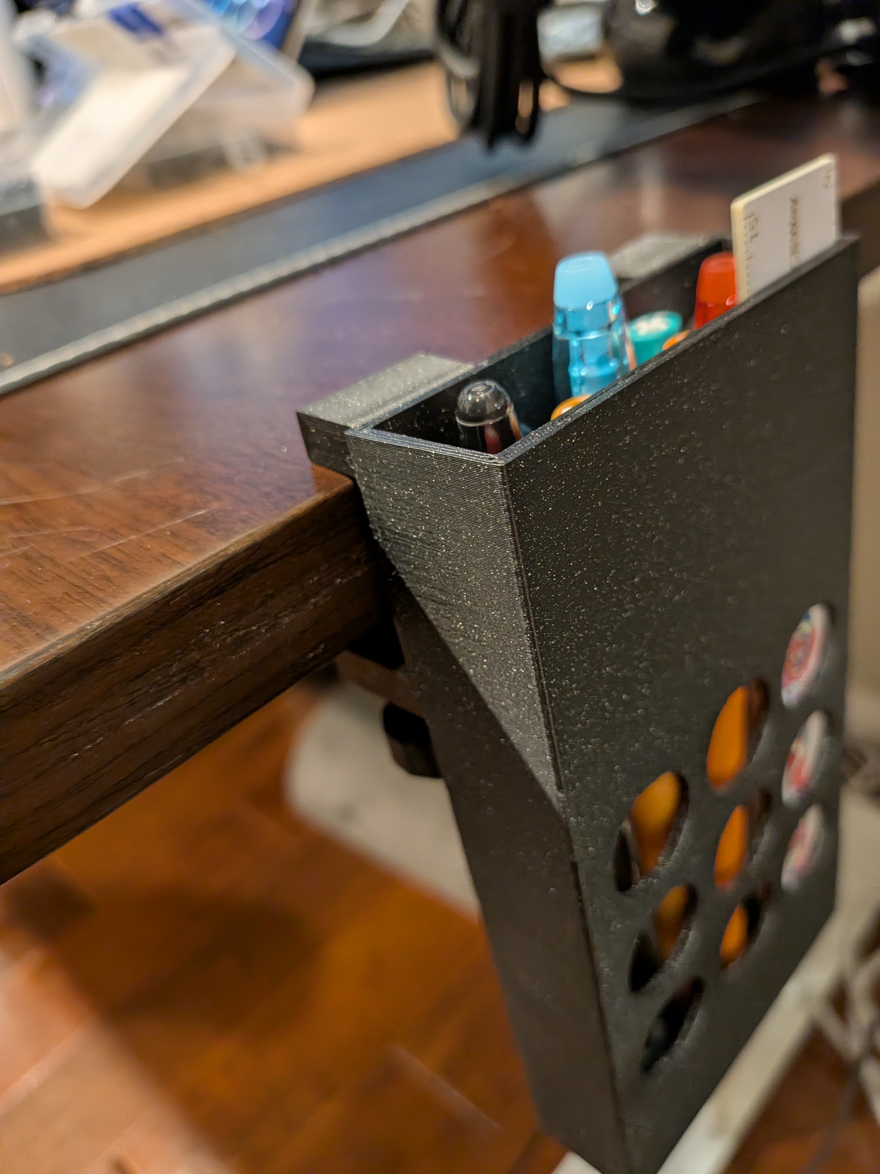 Table or under monitor mounted tool holder