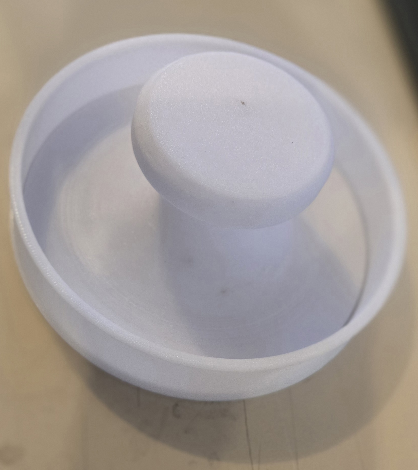 A burger patty press.