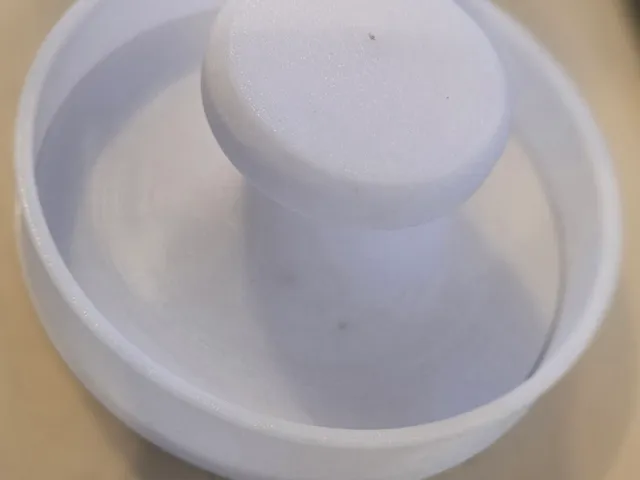 A burger patty press.