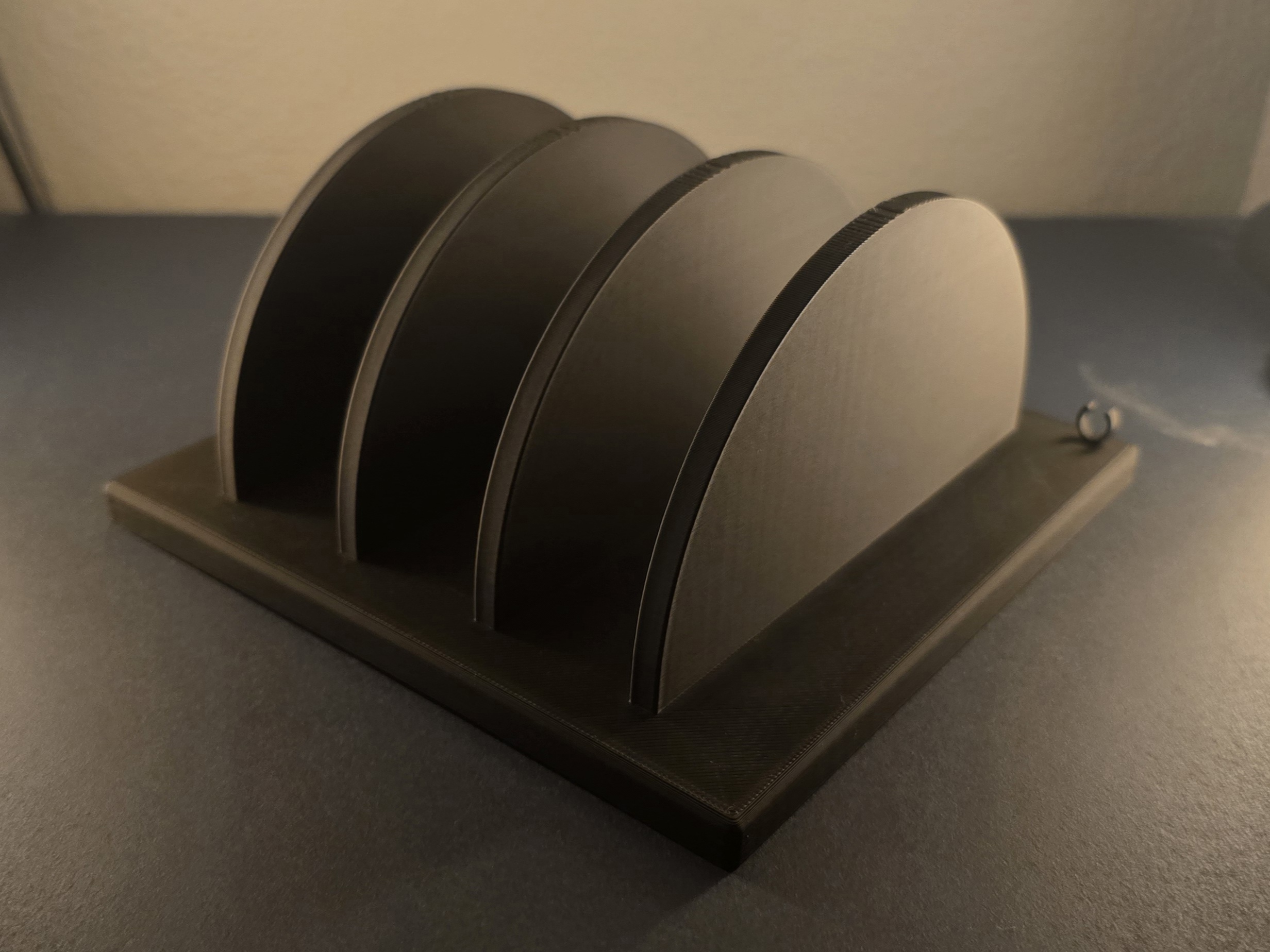 Laptop or tablet stand with cable clips.