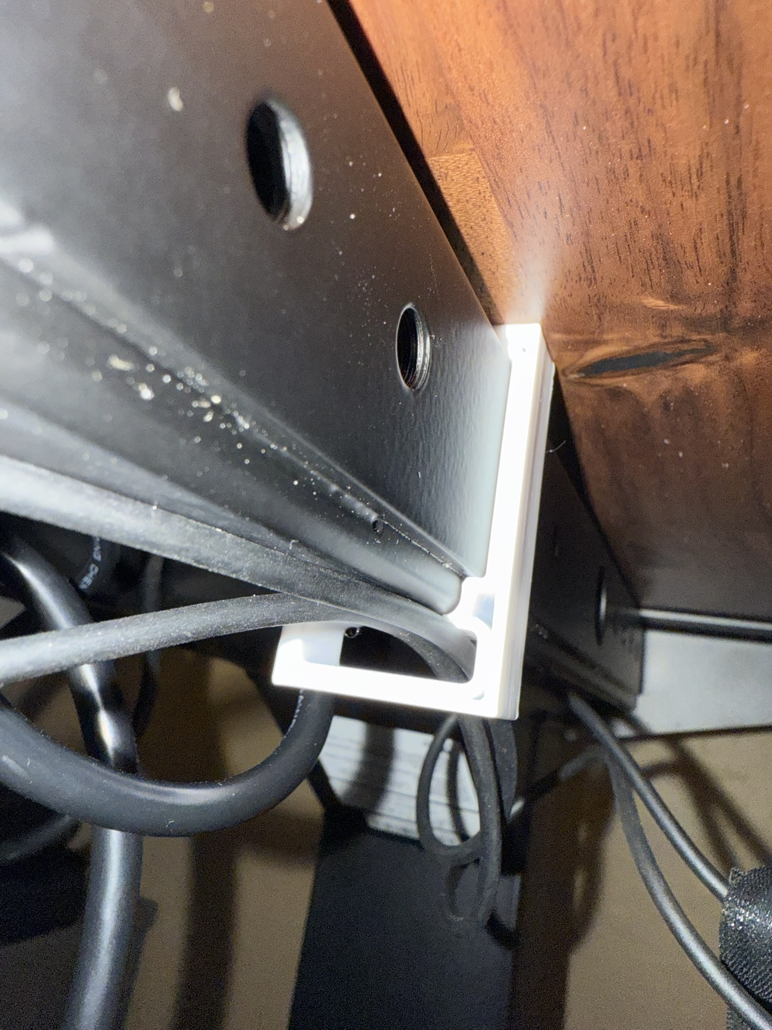 Uplift desk crossbar cable clips