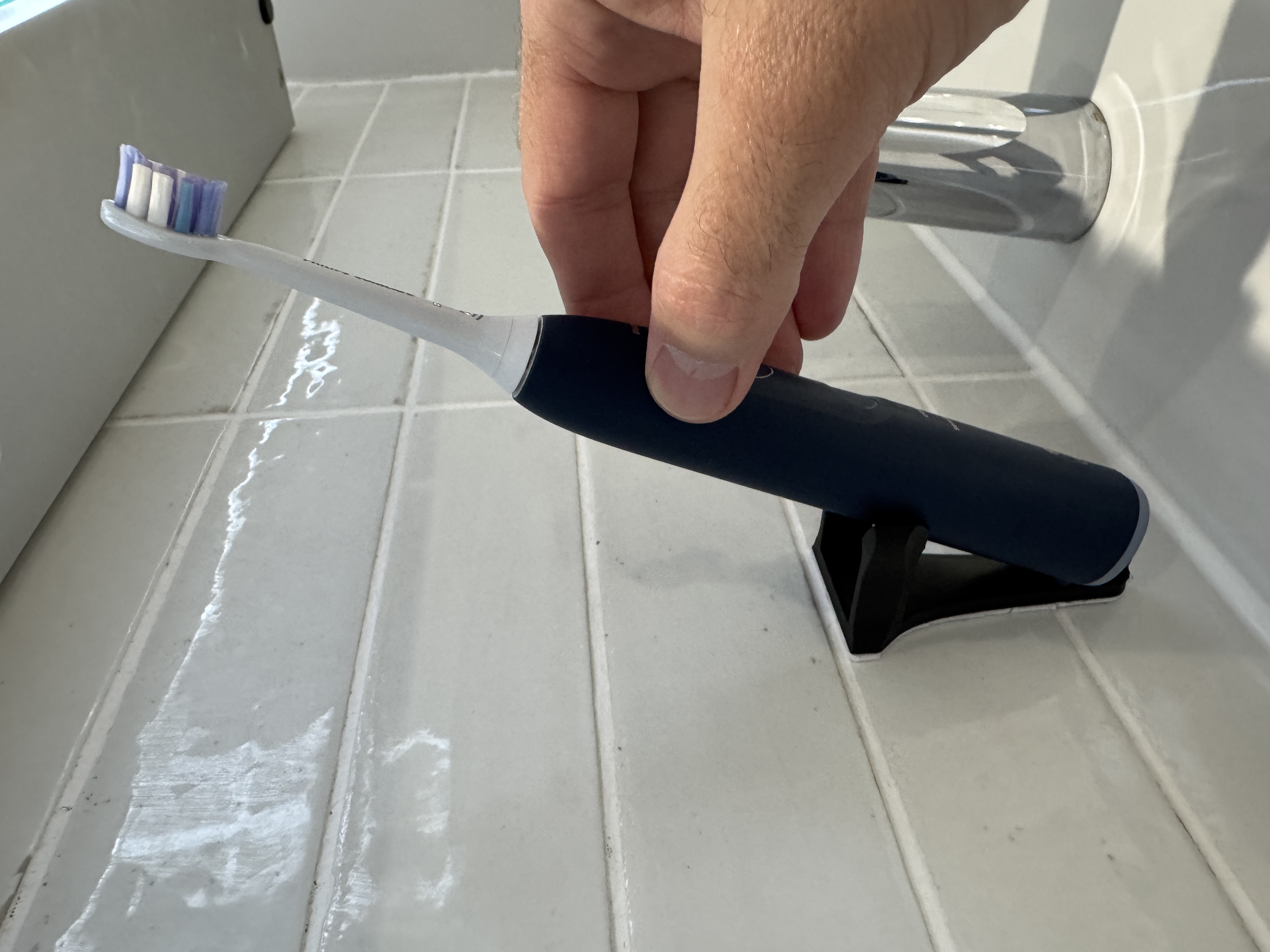 Wall mount for electric toothbrush