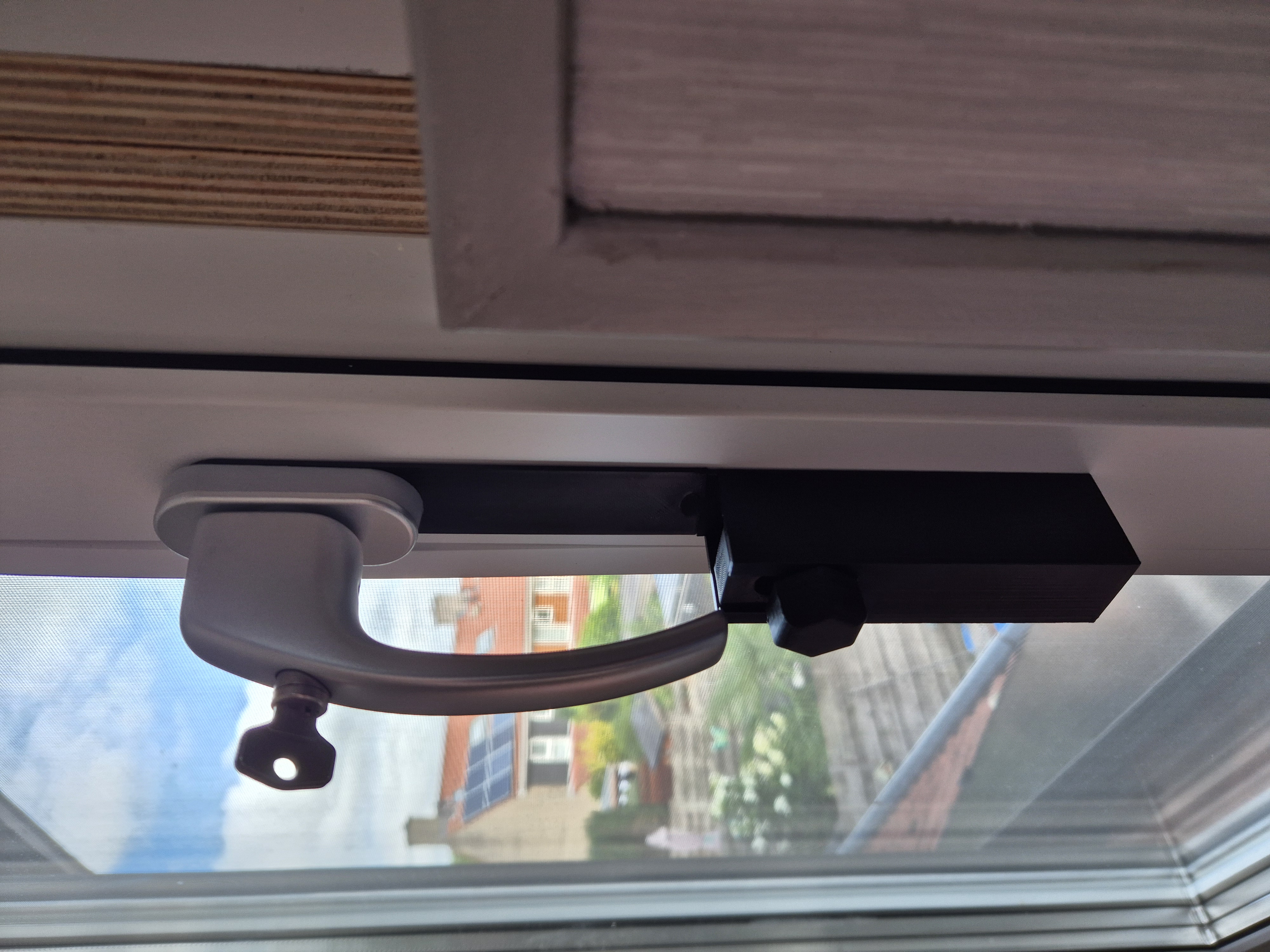 Storage box for the adjustable door/window stopper.