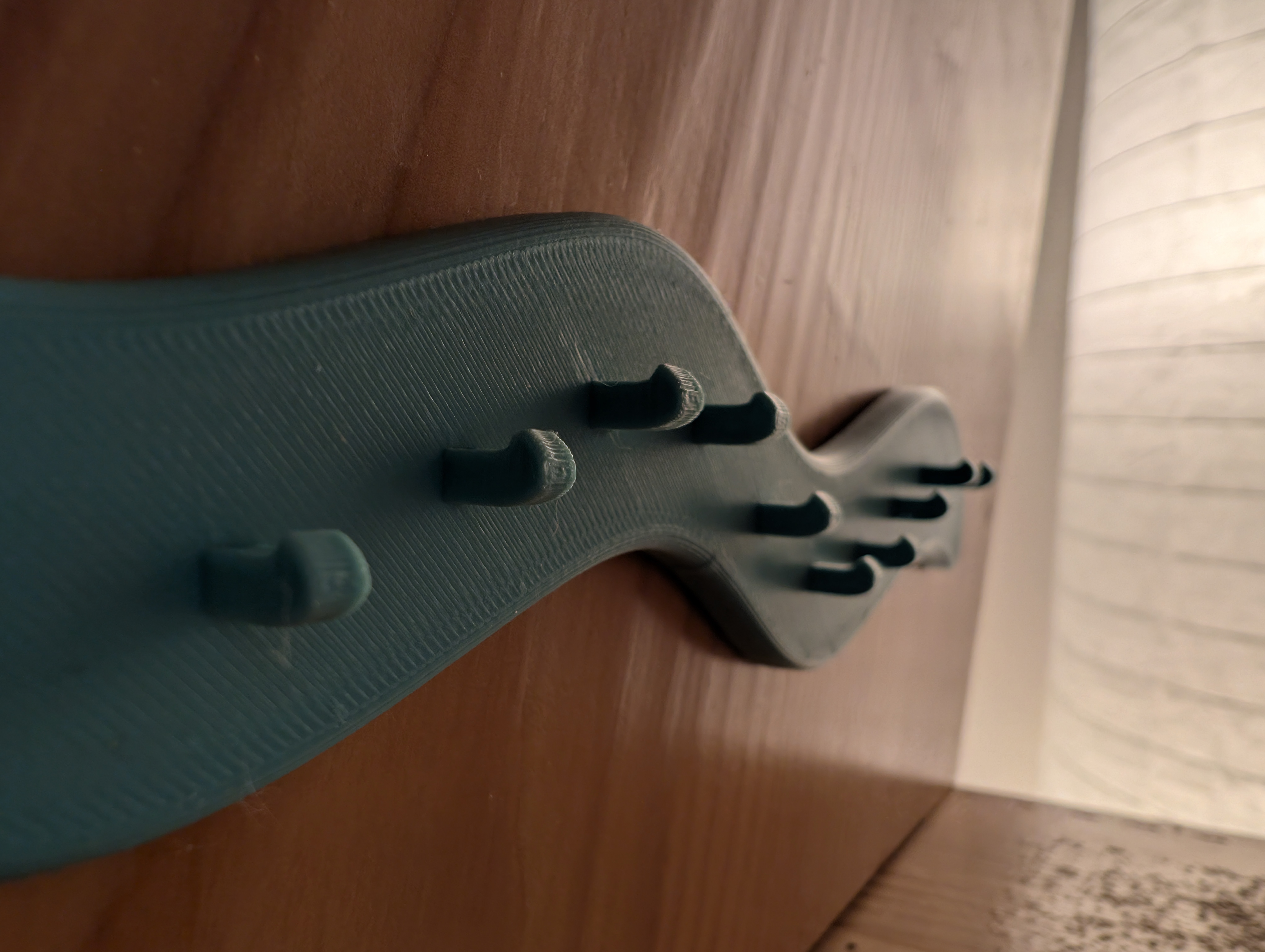 Necklace holder for wallmounting