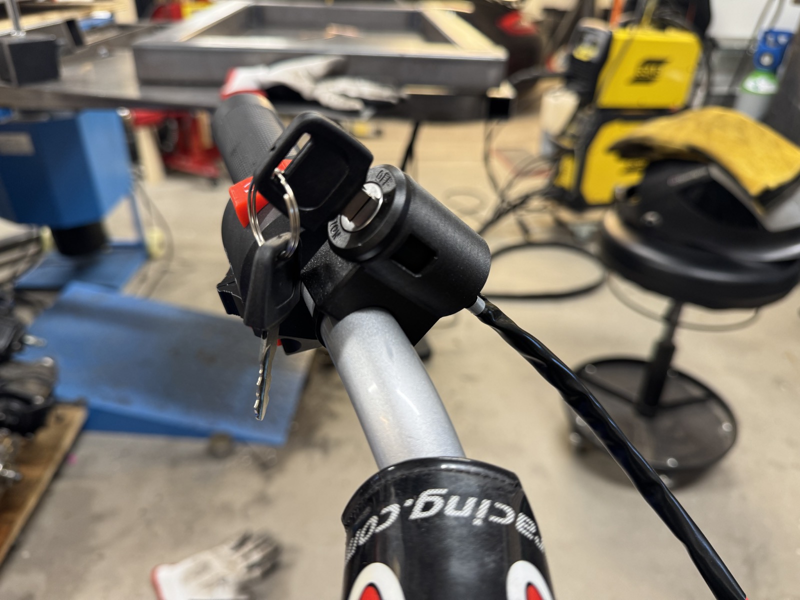 Ignition key lock holder for mini motorcycle