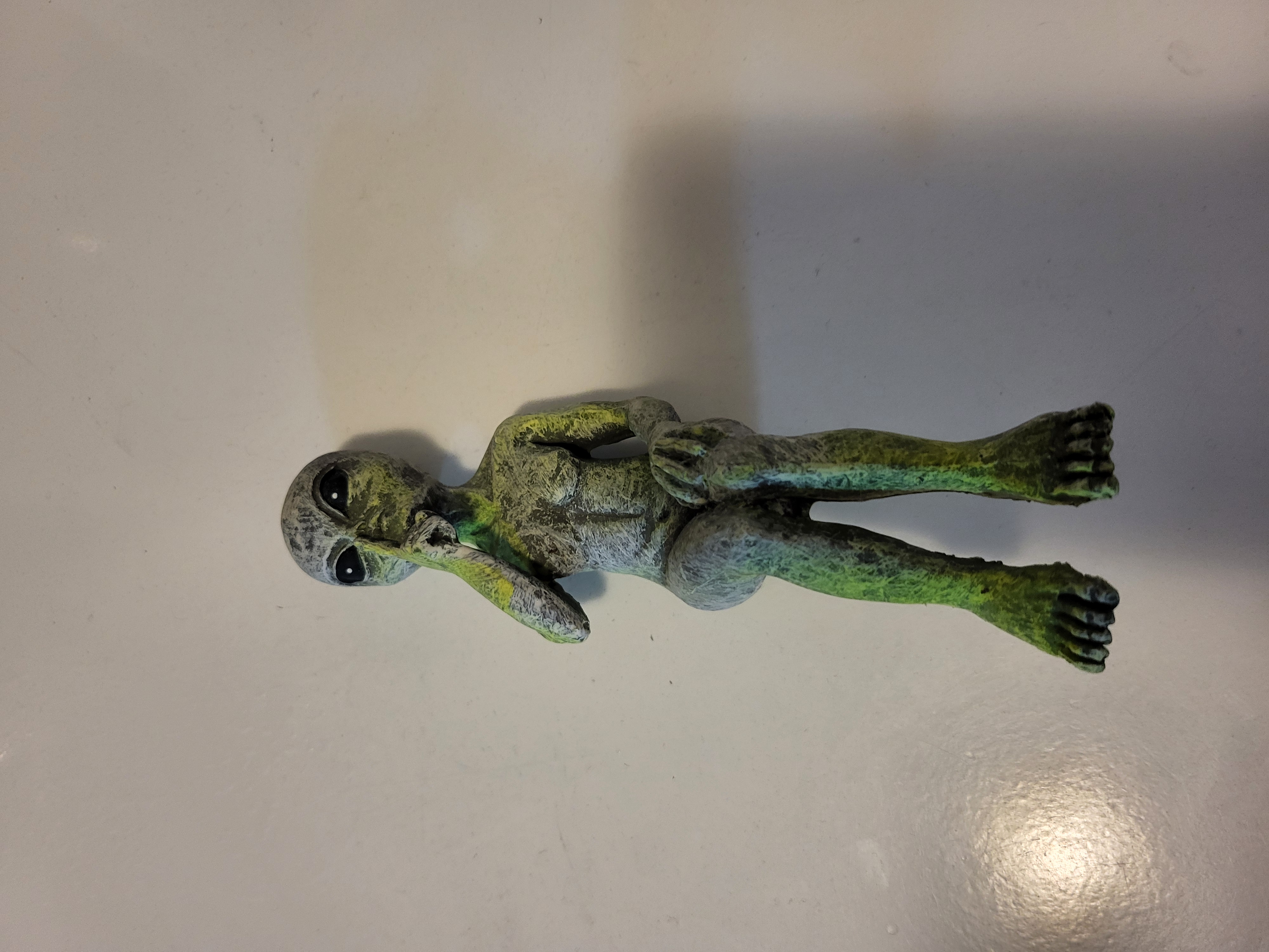 Alien Sitting sculpture