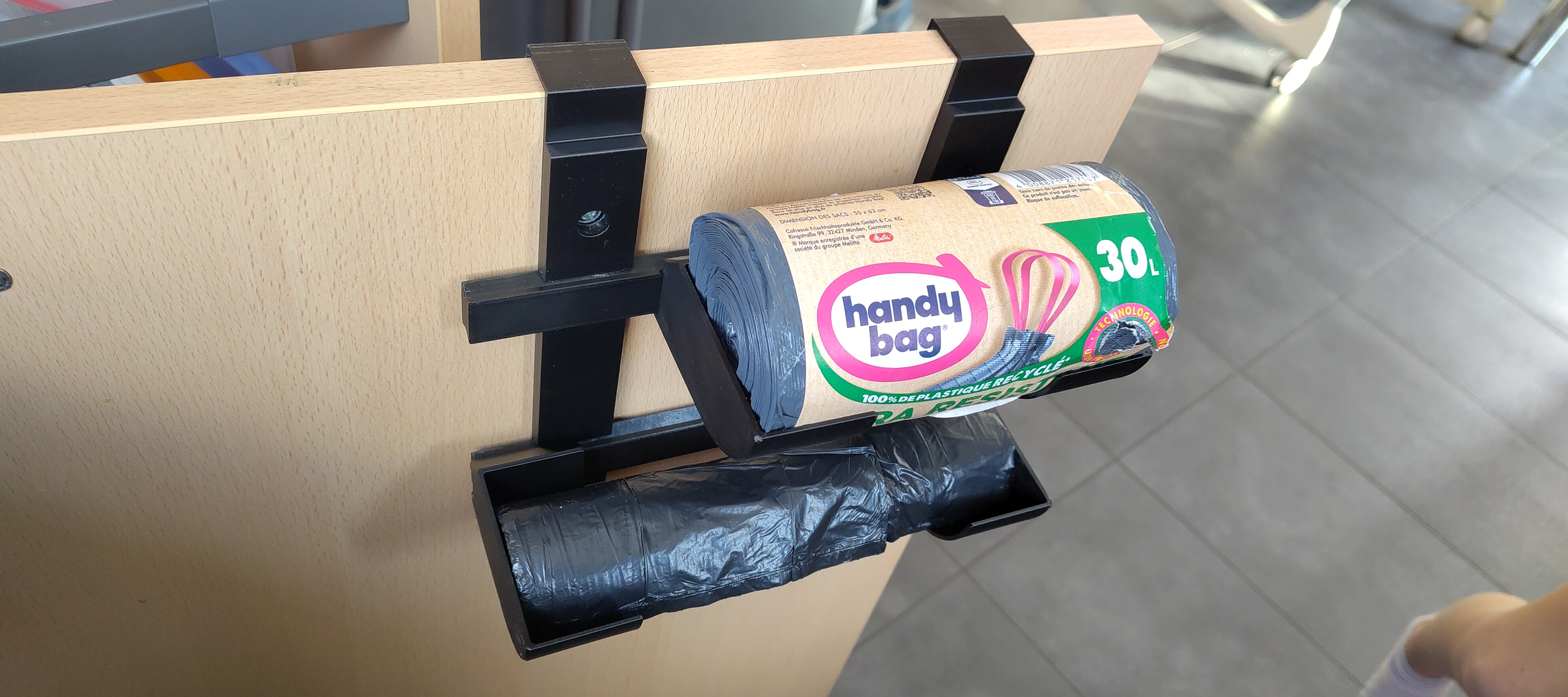 Yet Another Trash Bag Roll Holder (that can do more)