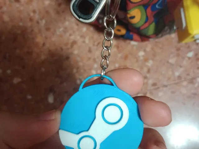 Llavero del logo de "Steam".