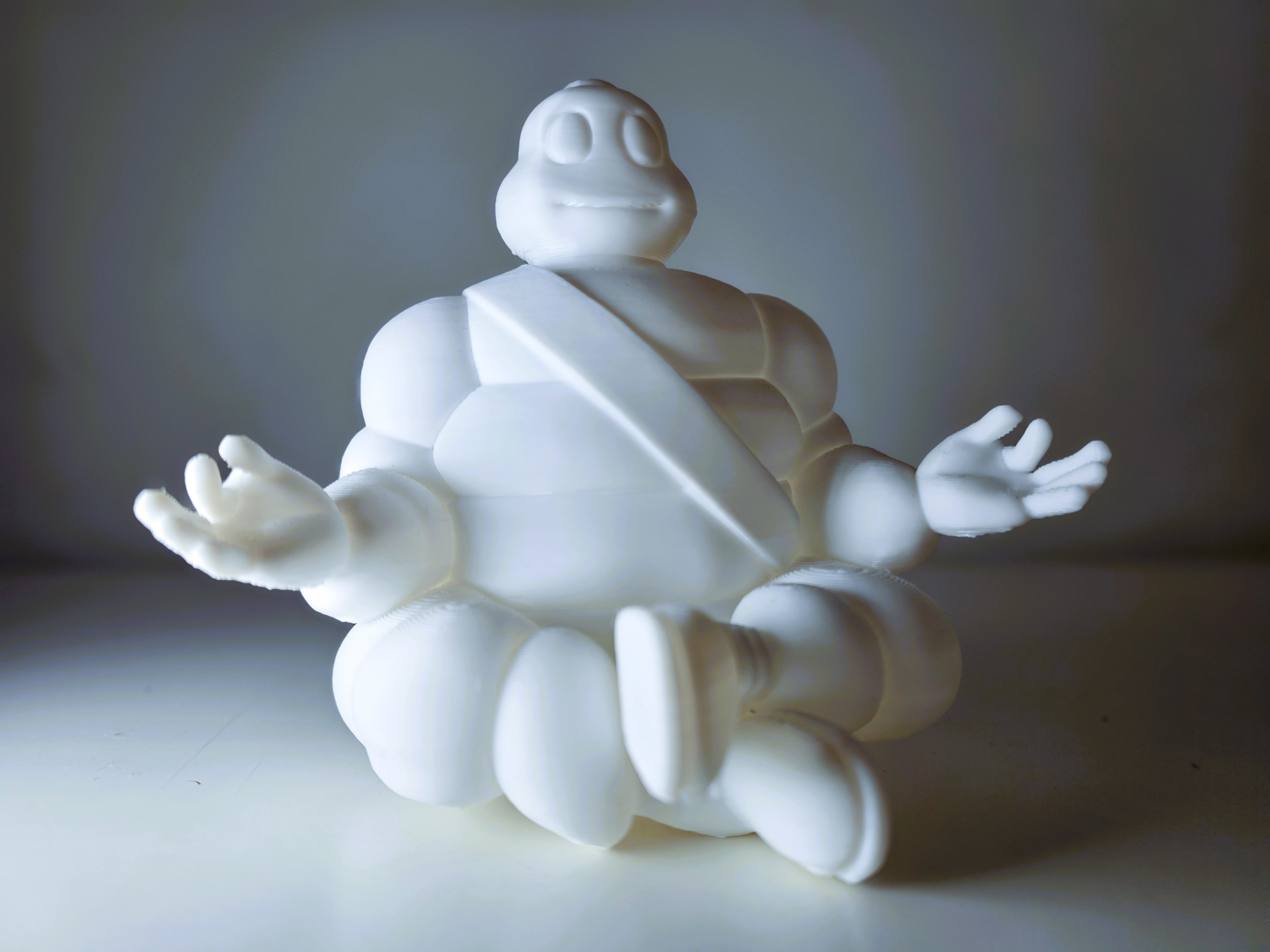 Michelin's Bibendum meditating figure