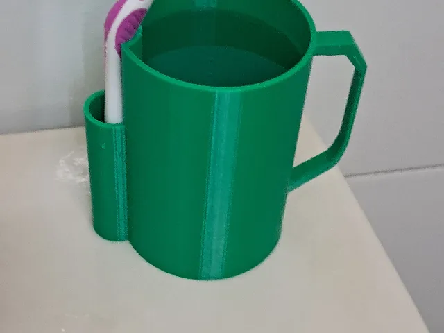 water cup with toothbrush compartment