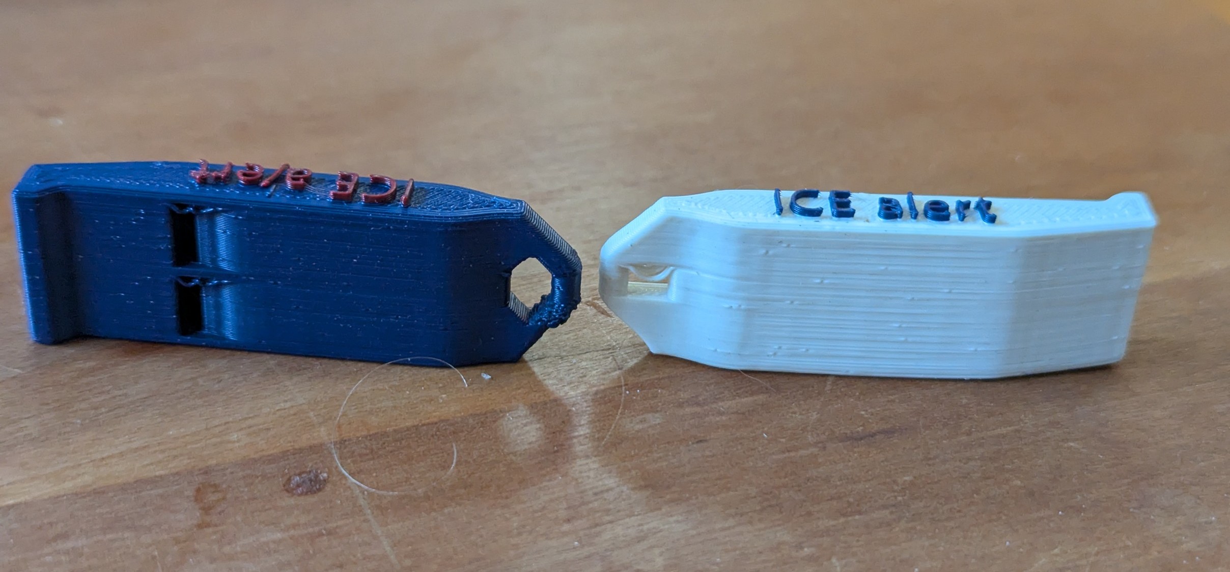 V2 Whistle with easier print lanyard/keyring hole and text