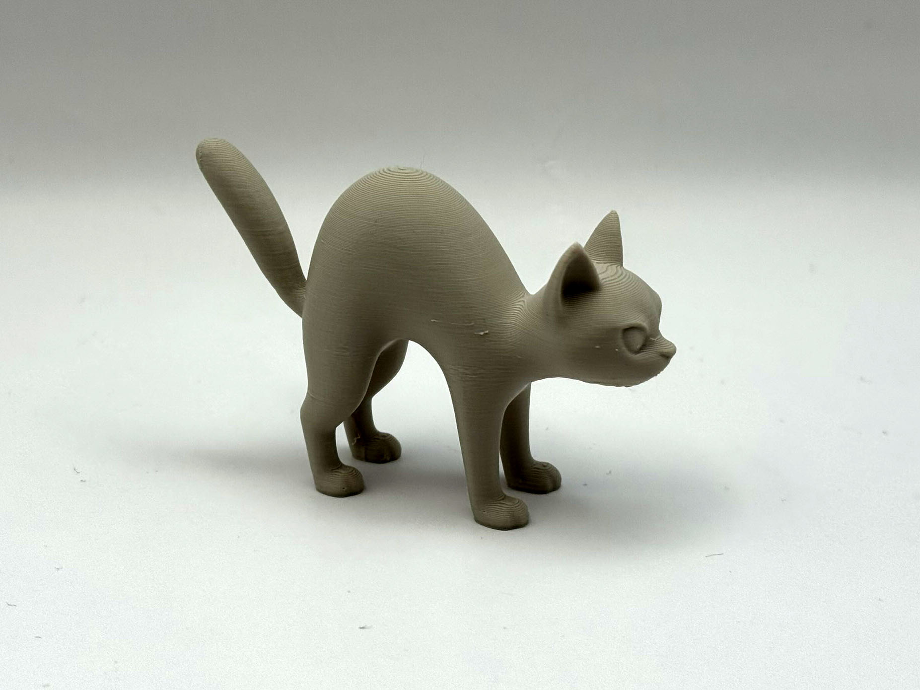 Simple Arching Cat Figurine