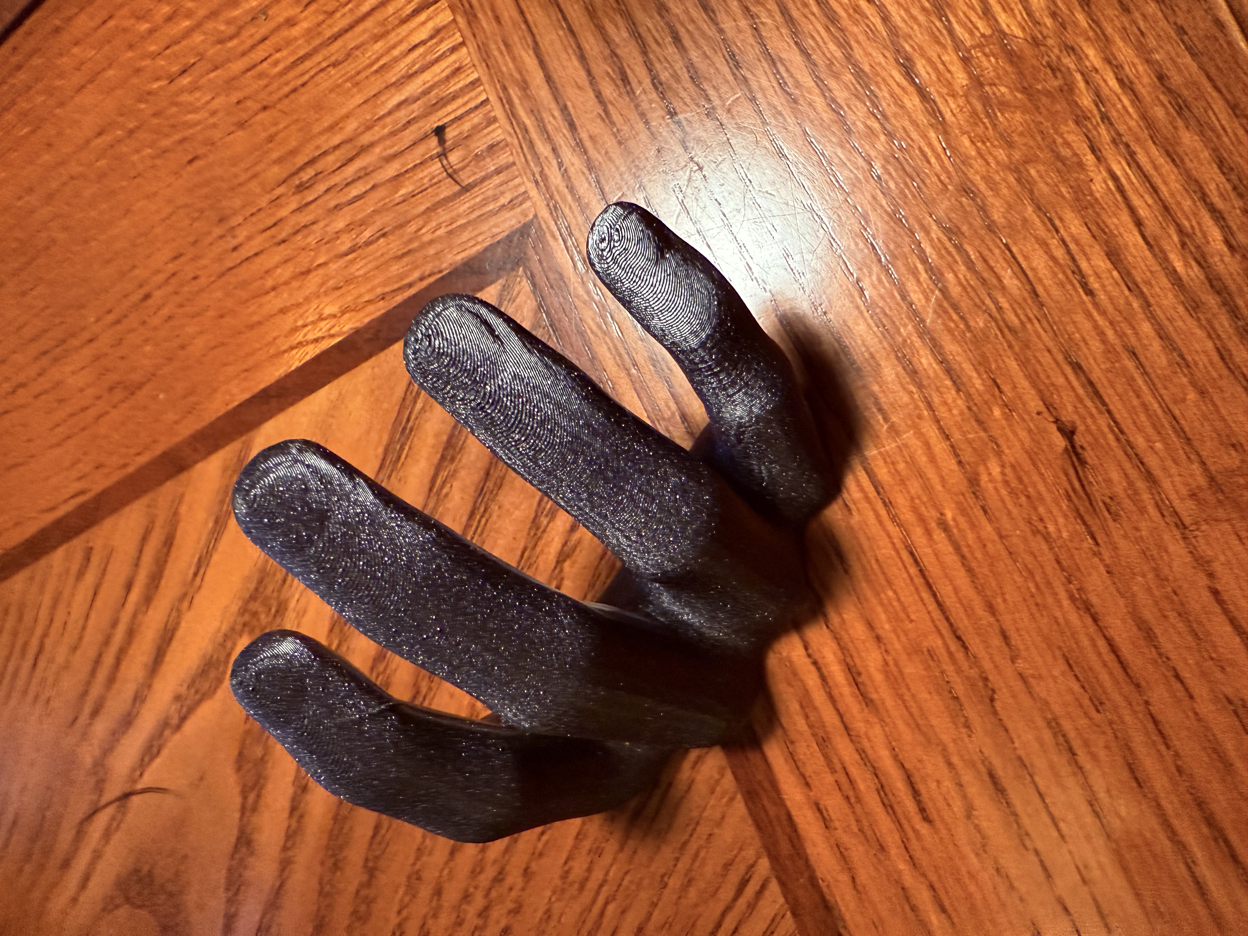 Finger nail tester hand