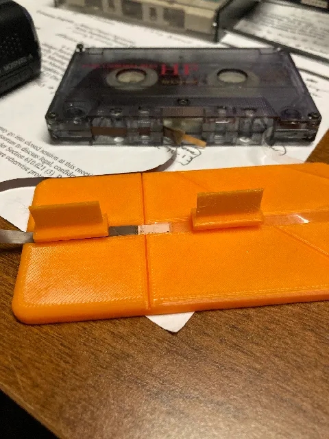 Wedge for cassette tape splicing block