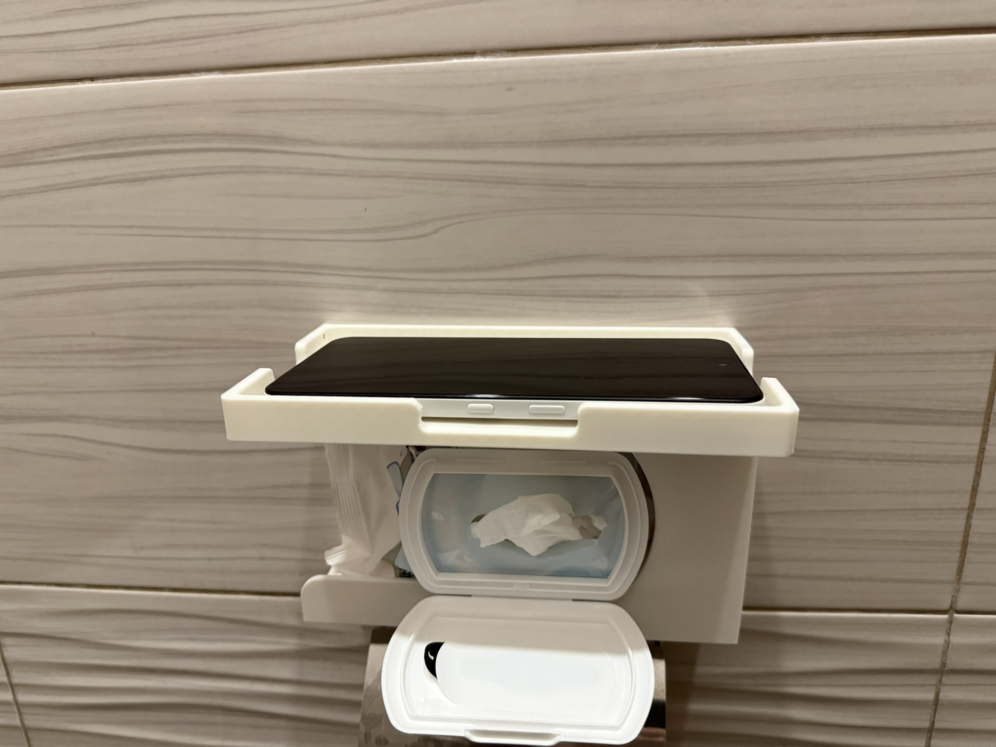 Wet wipe wall holder with phone plate