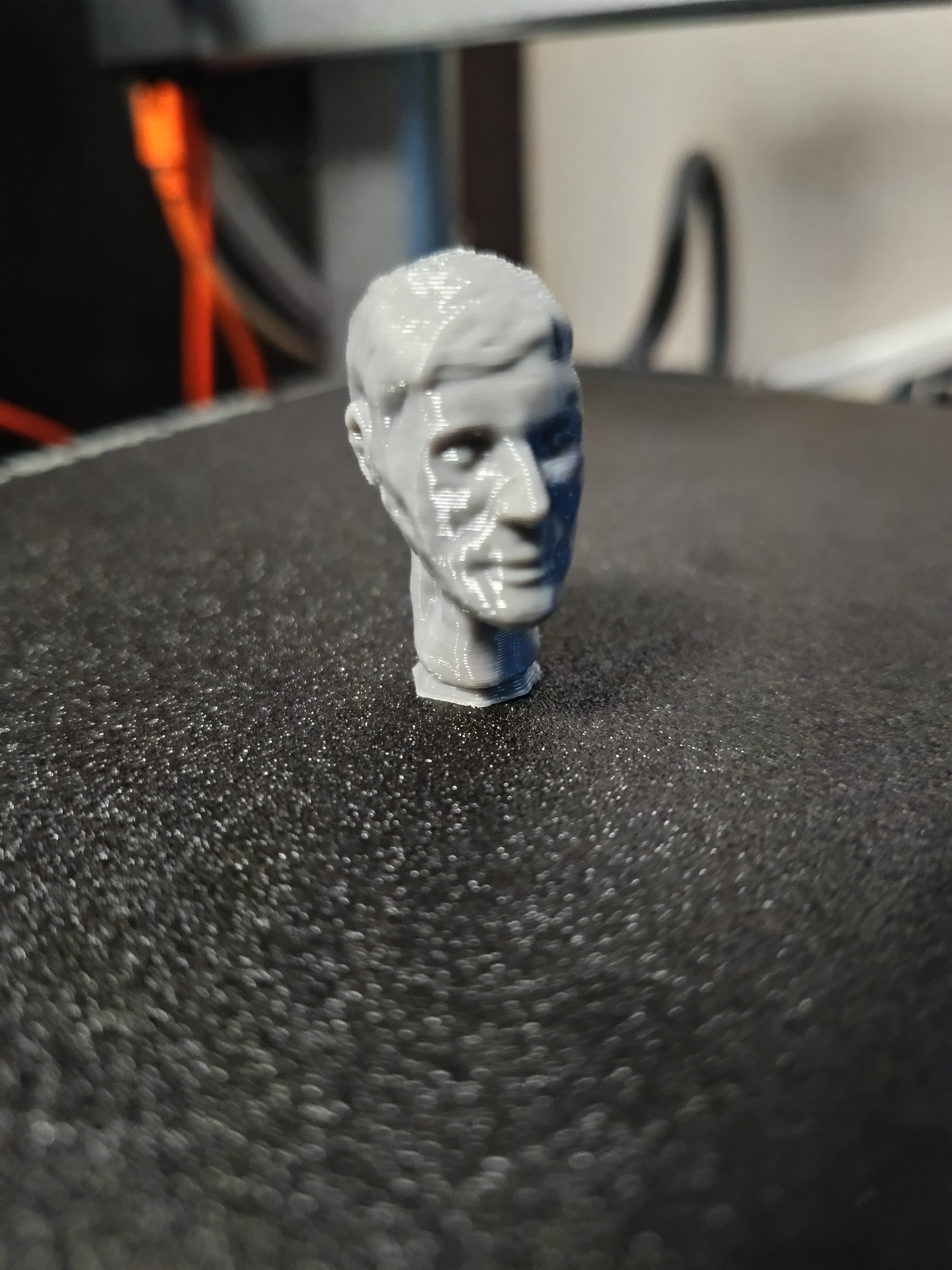 Bearded head statue
