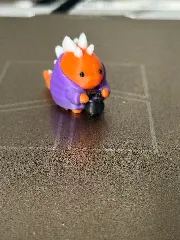 cute magic dino with cauldron