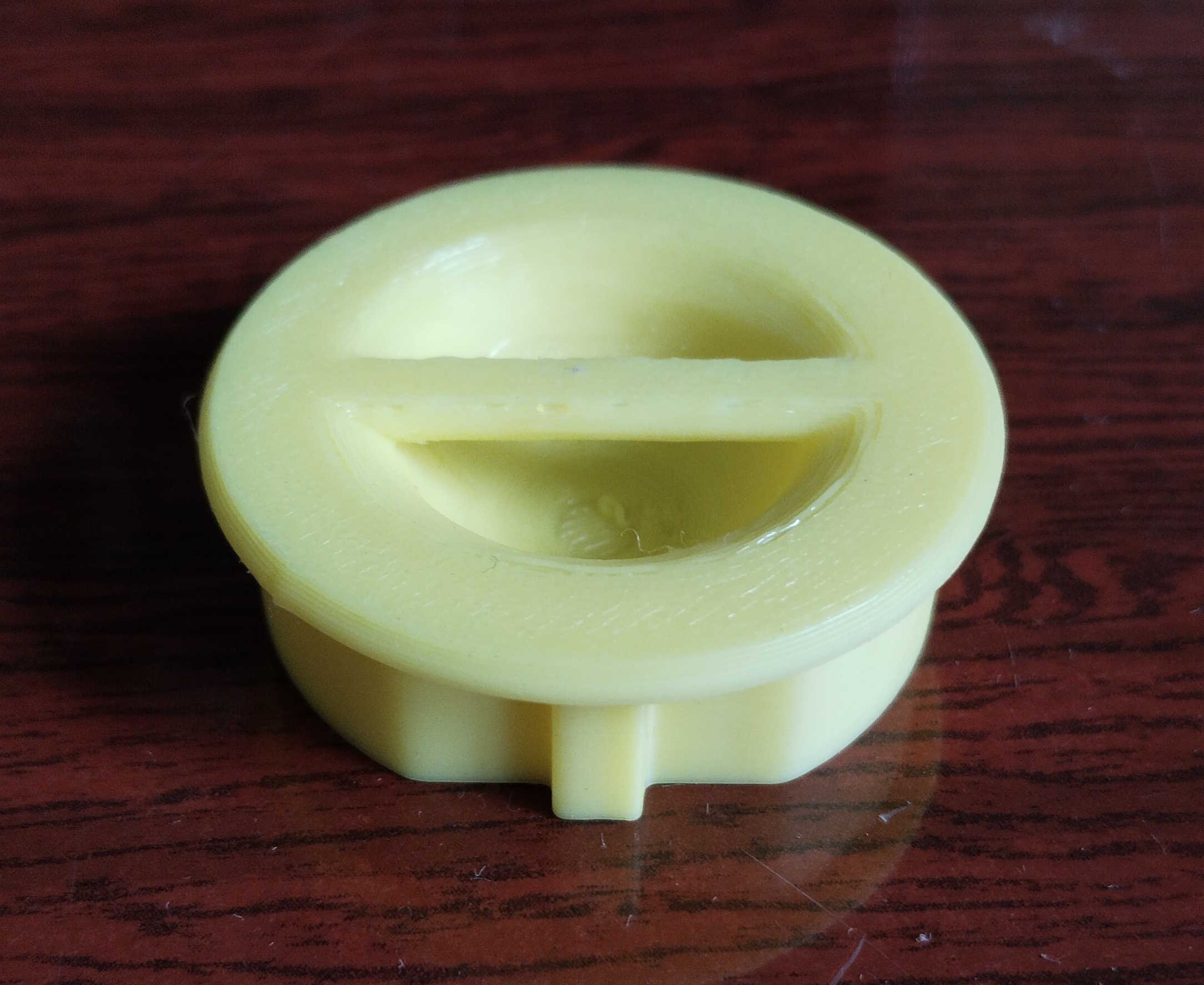 Euro socket cover with handle for easy removal.