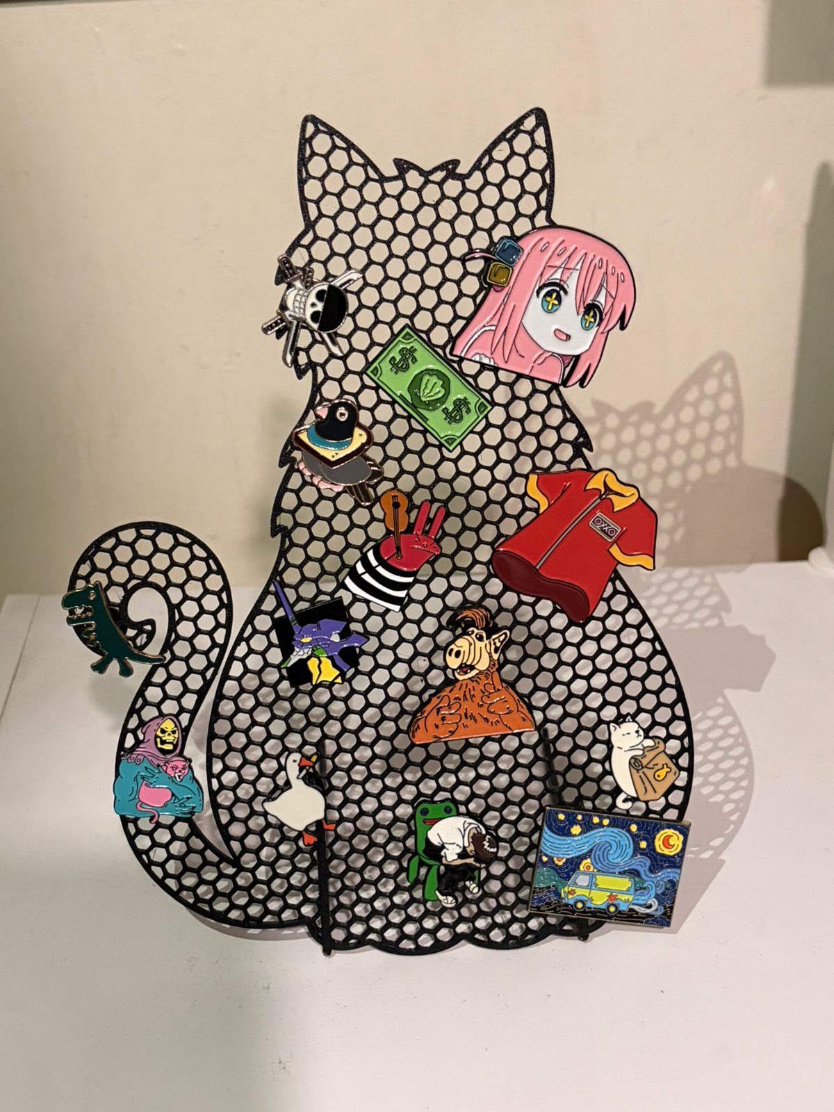 Enamel pin cat display