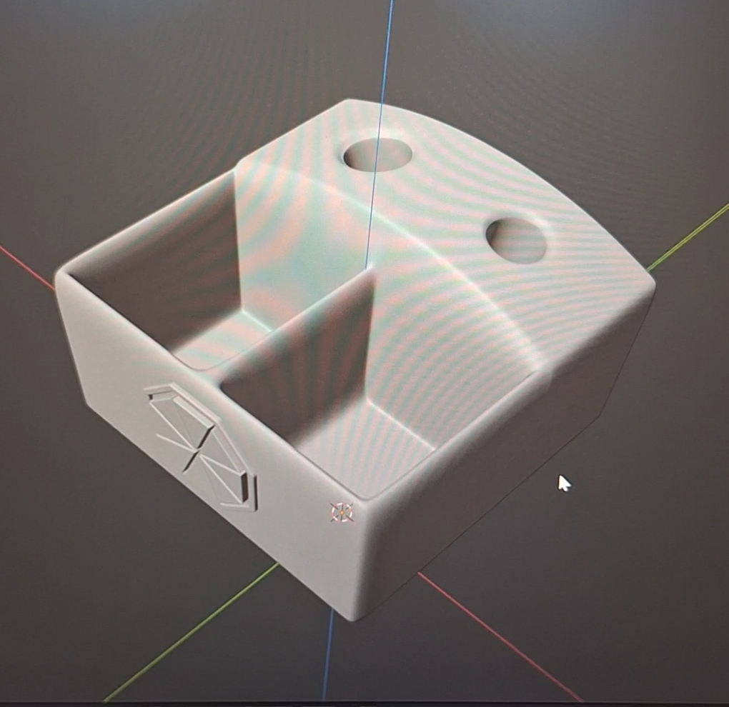 Small holder with 2 holes and 2 boxes for stuff.