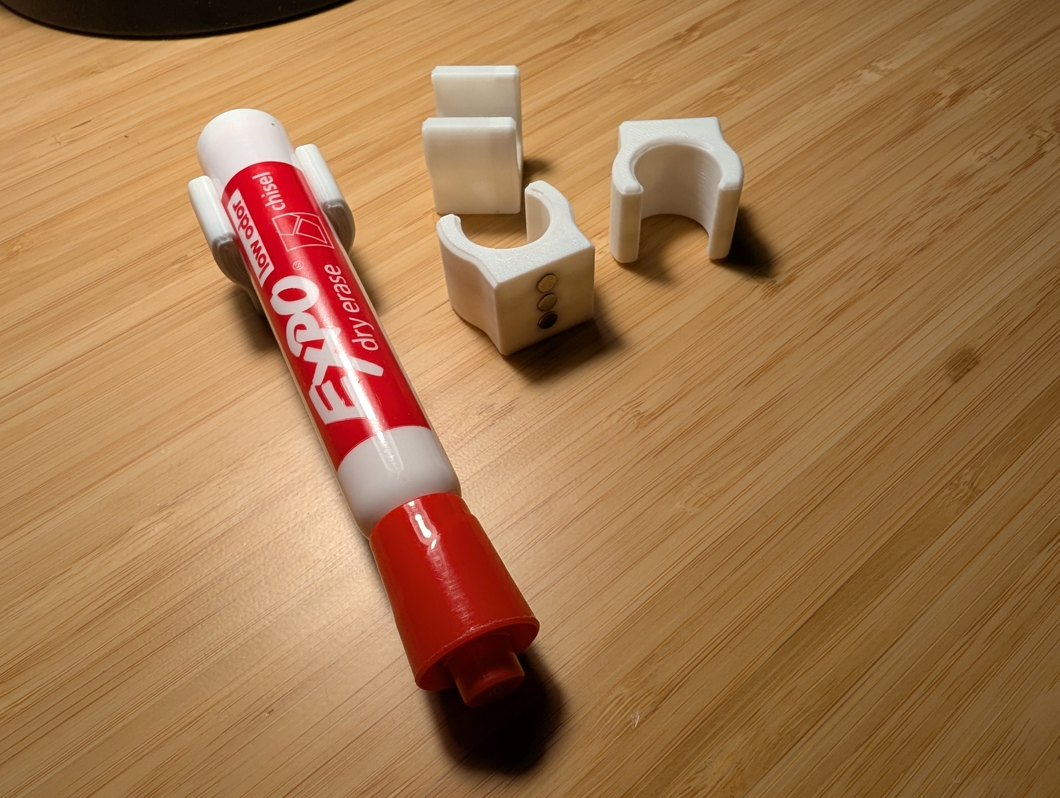 Magnetic clip for whiteboard markers