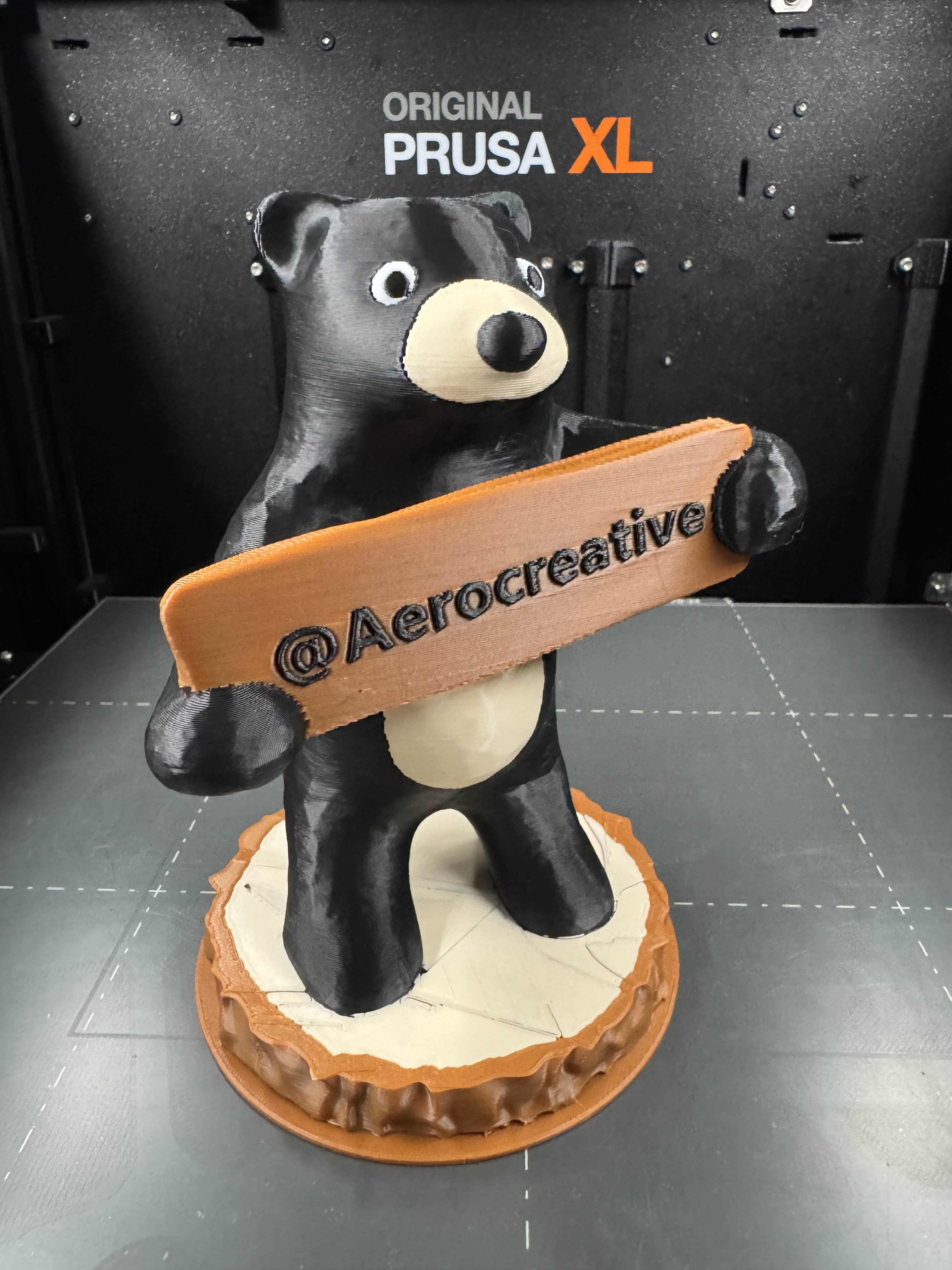 Bear Holding Sign