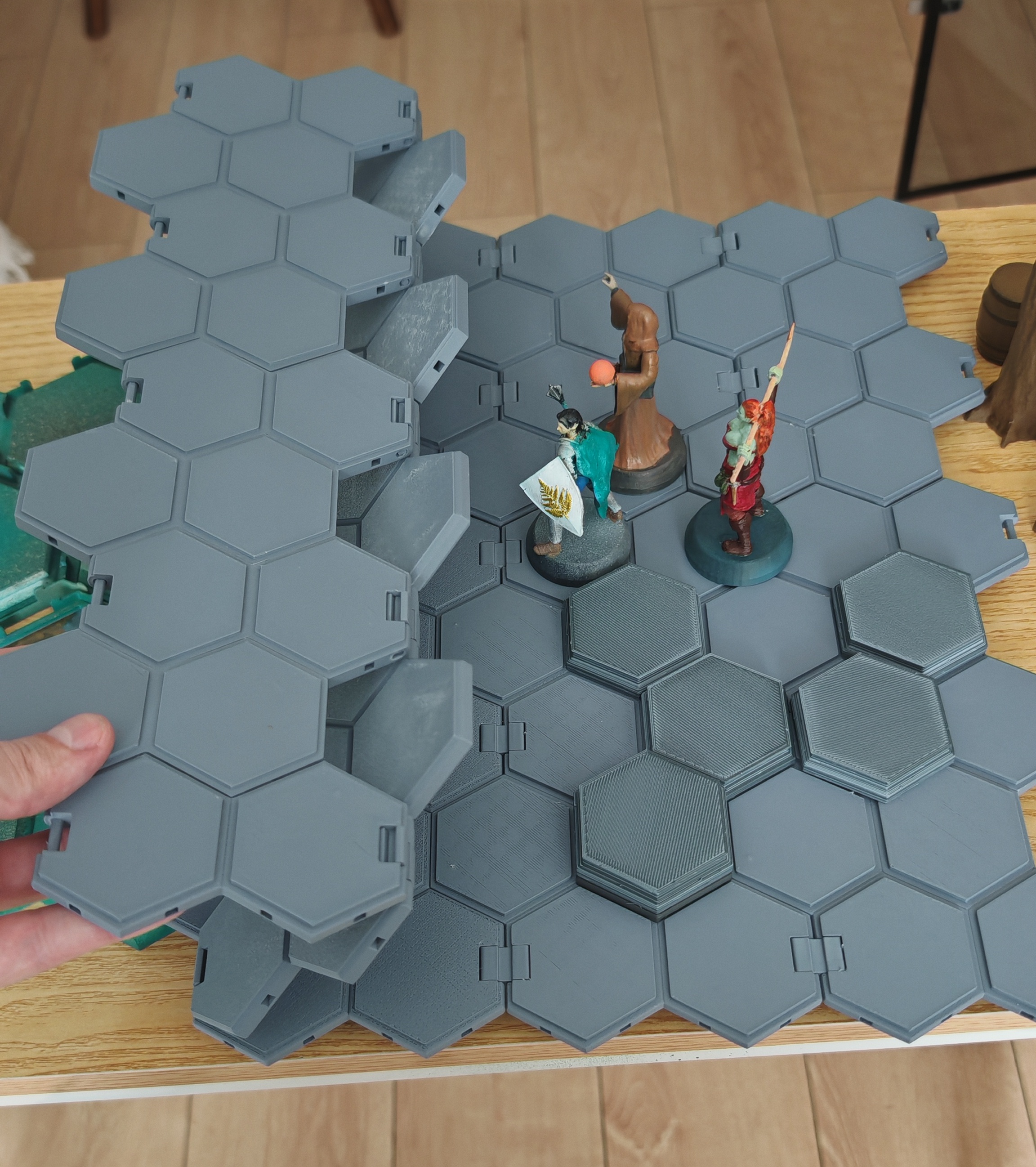 Foldable battlefield with hexagonal grid