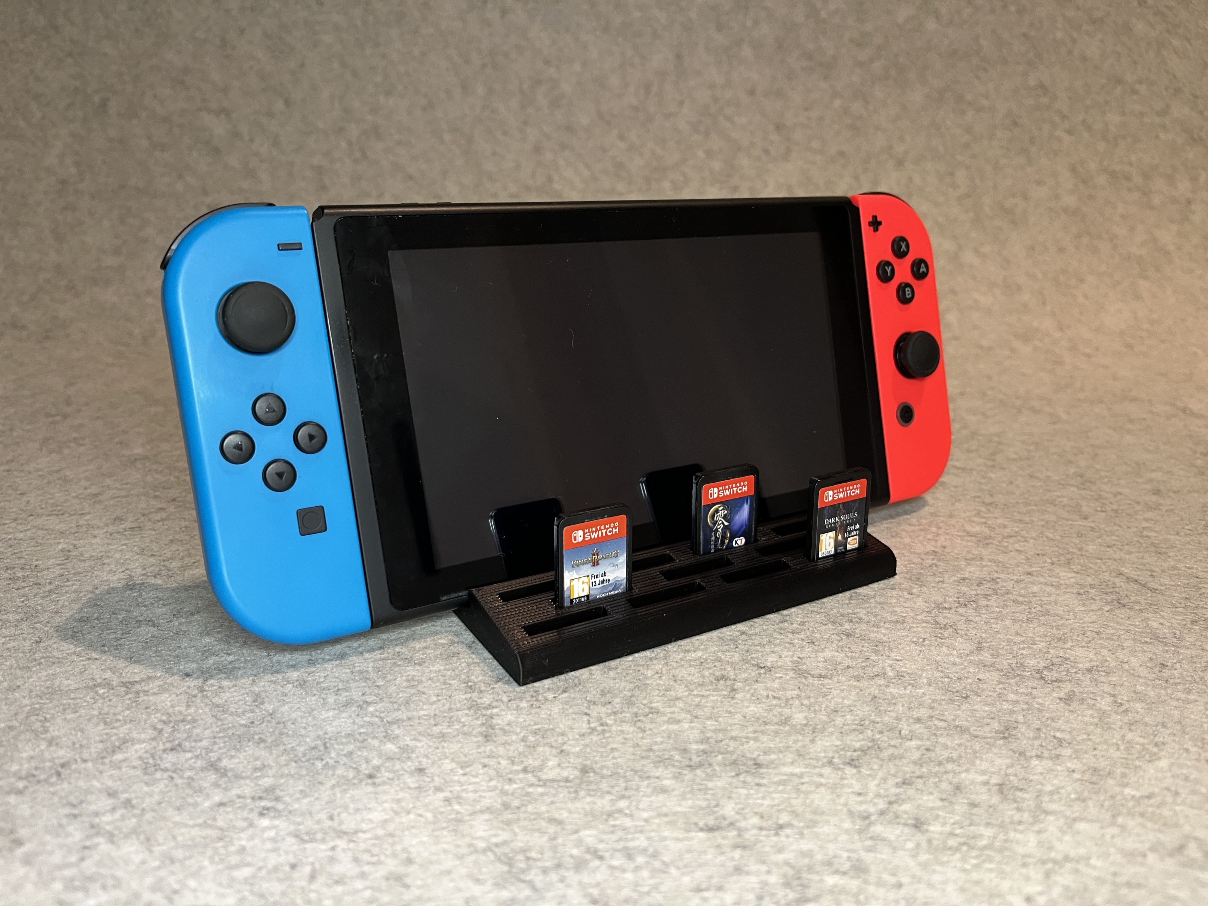 Stand for Nintendo Switch and 11 game cartridges