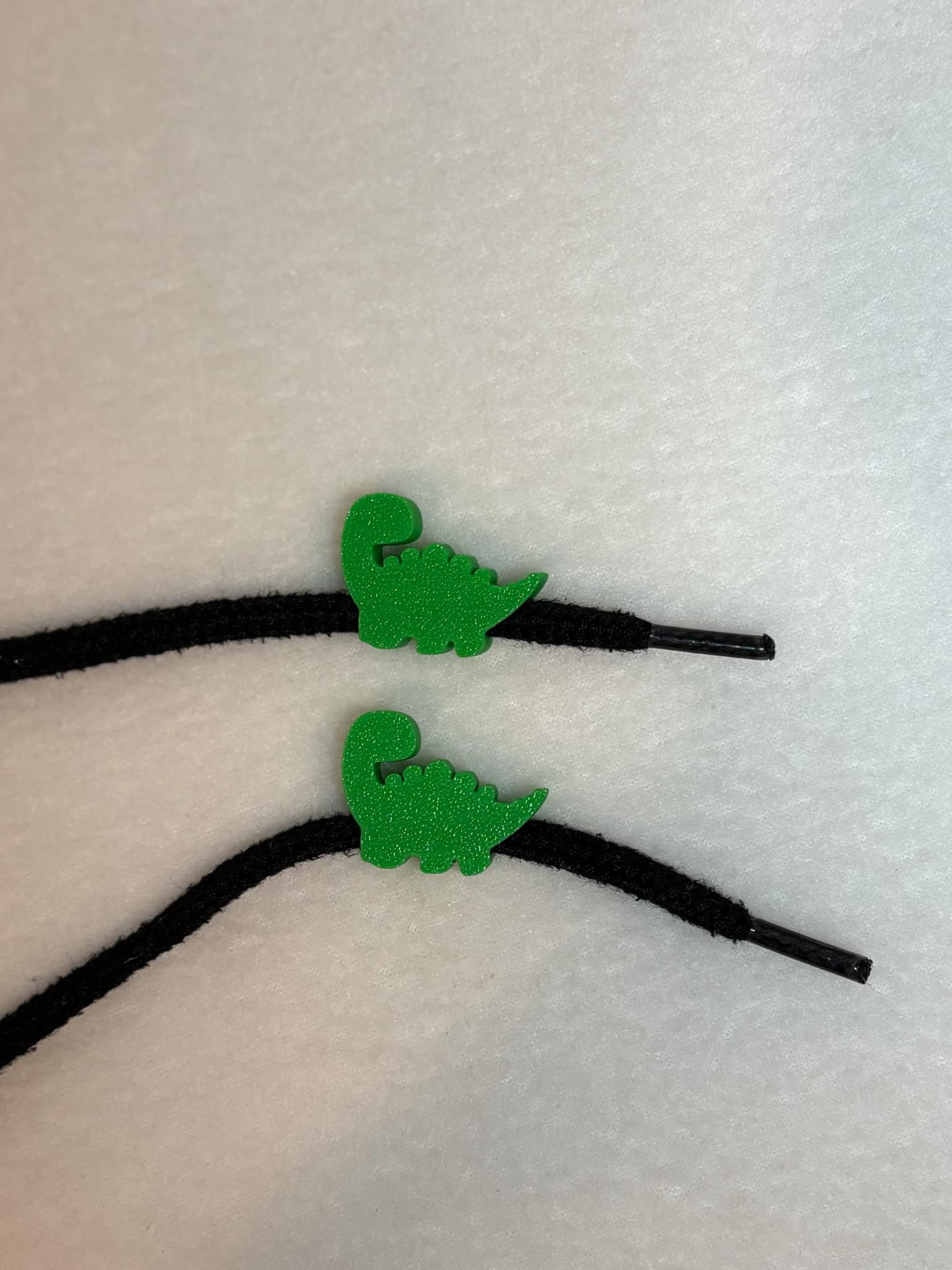 Stegosaurus dinosaur drawstring beads
