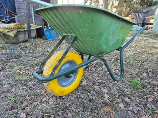 Wheel barrow bearing dust cap