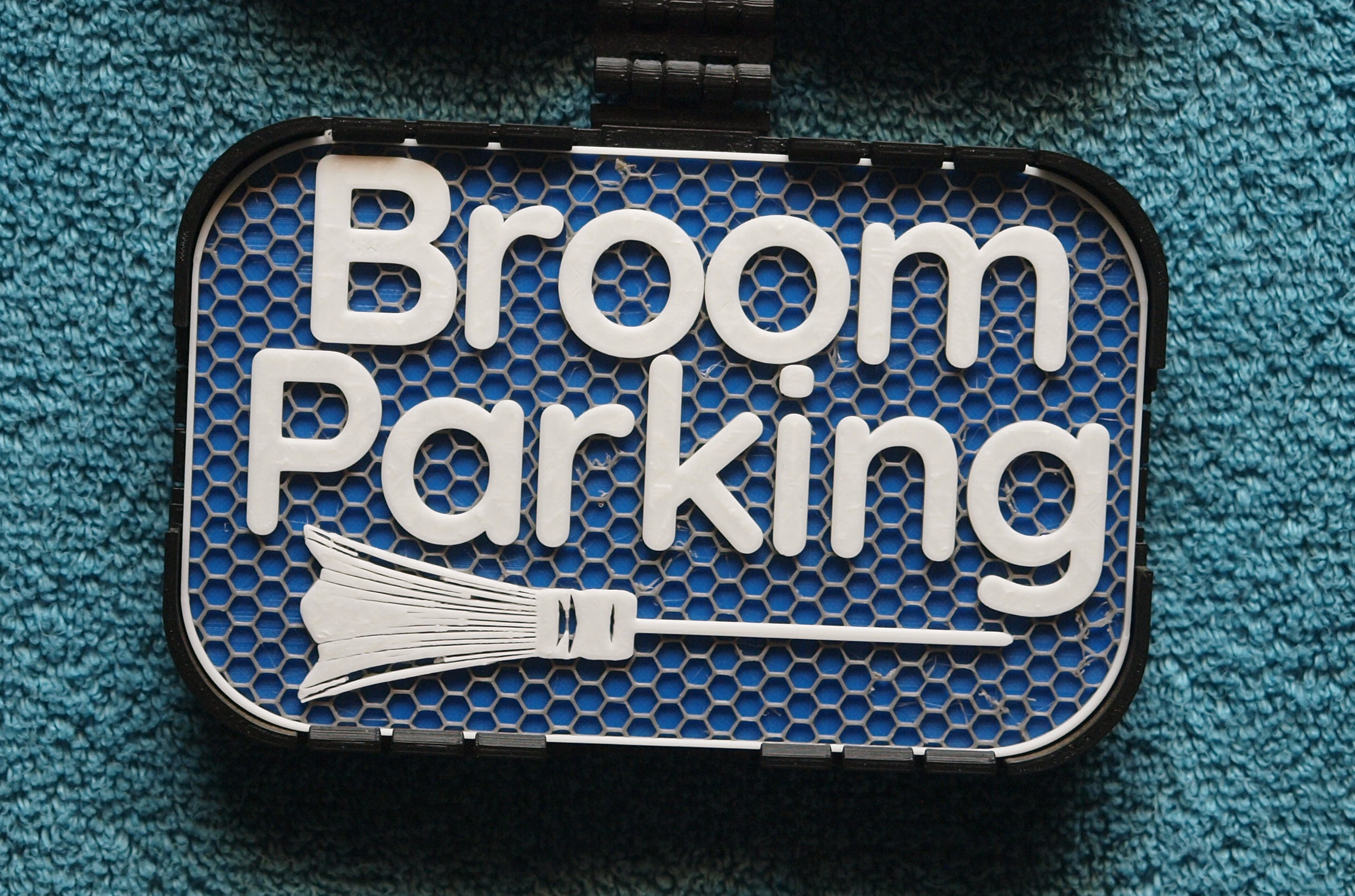 Broom Parking sign