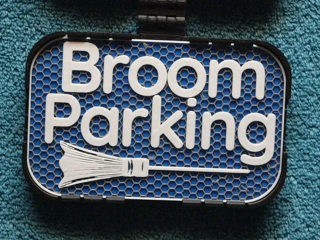 Broom Parking sign