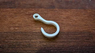 Hook with eyelet