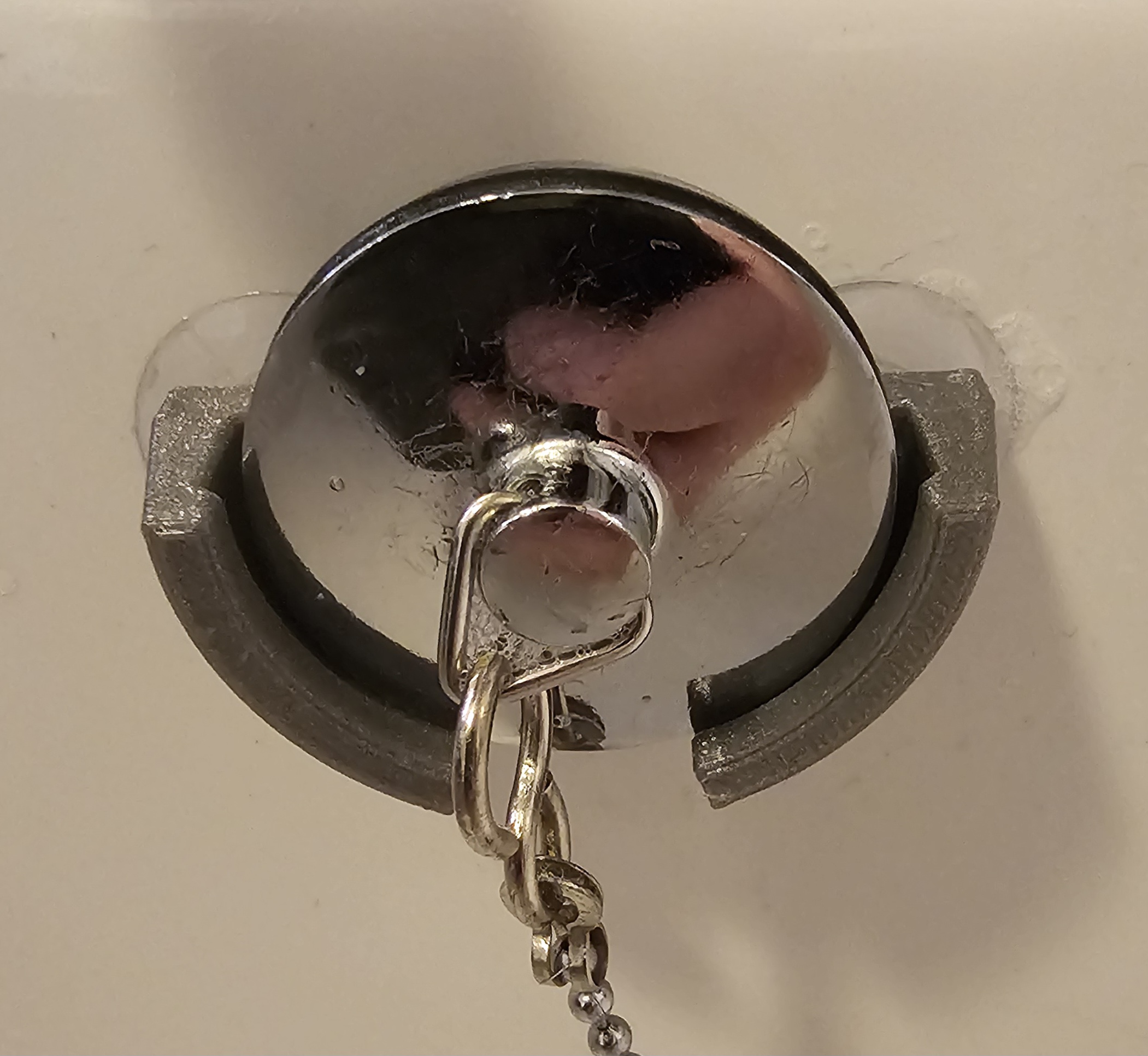 Sink plug holder