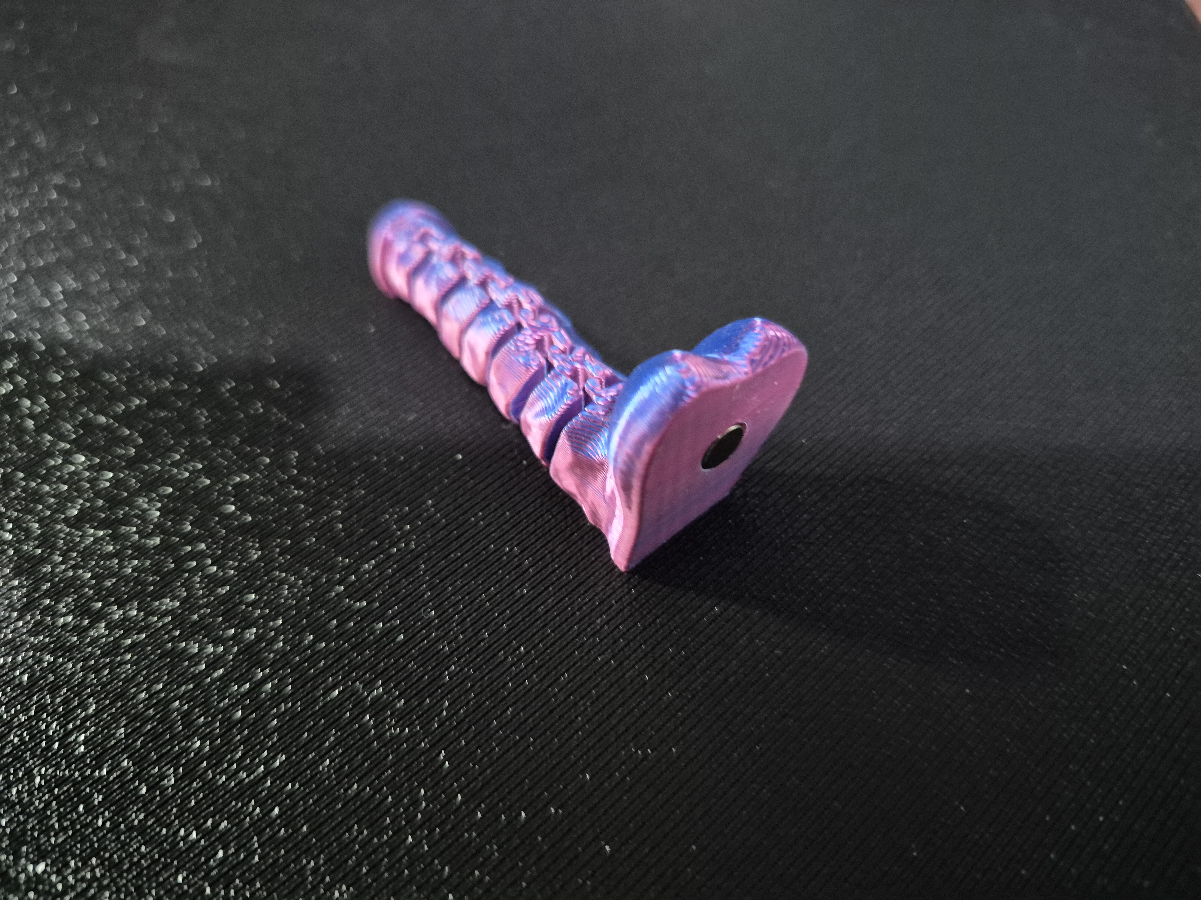 Articulated Dick with magnet hole
