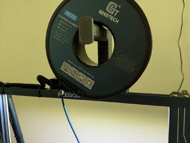 Top rail front facing 3d printer reel holder