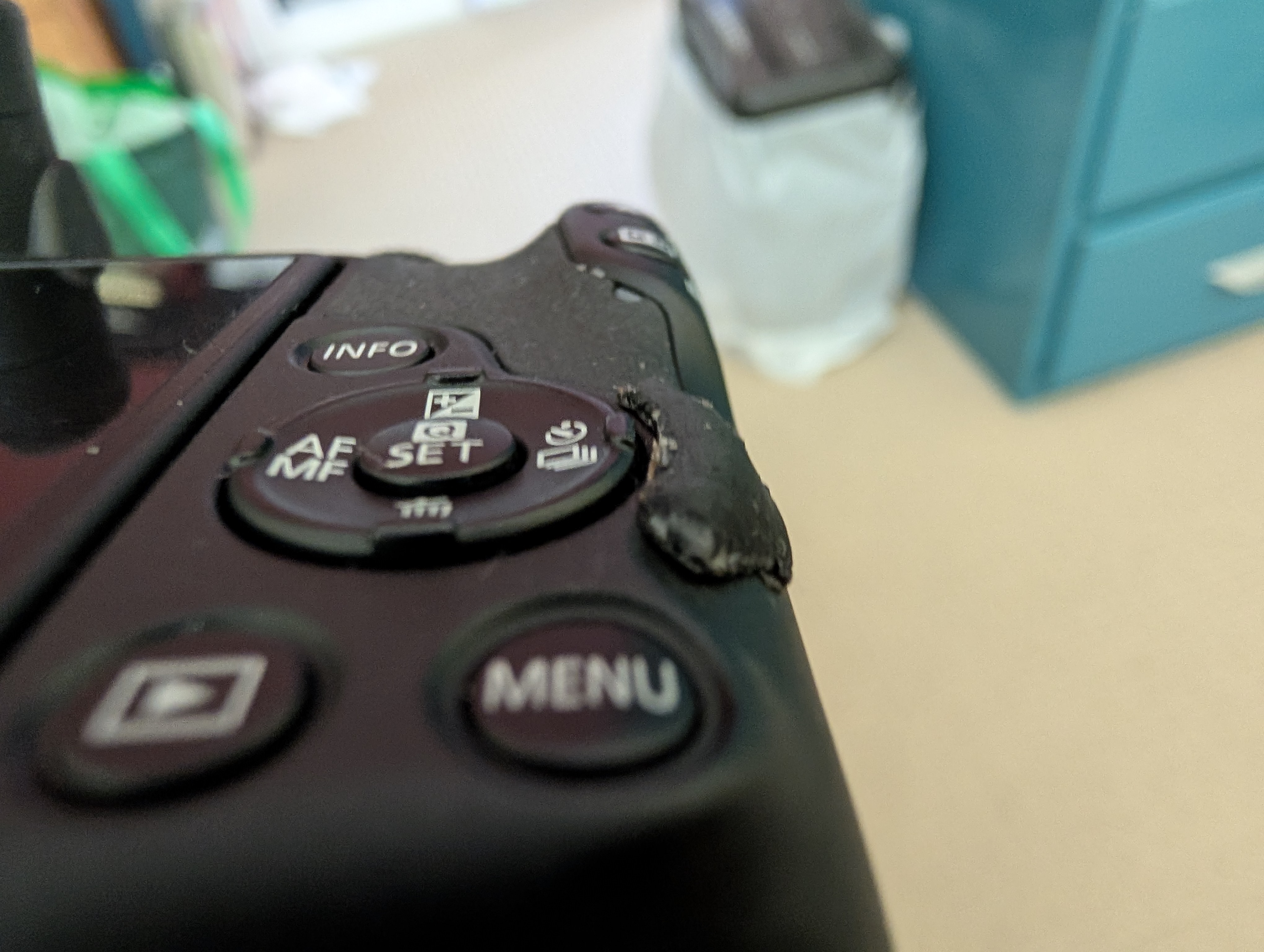 Canon R50 palm Drive Mode shield