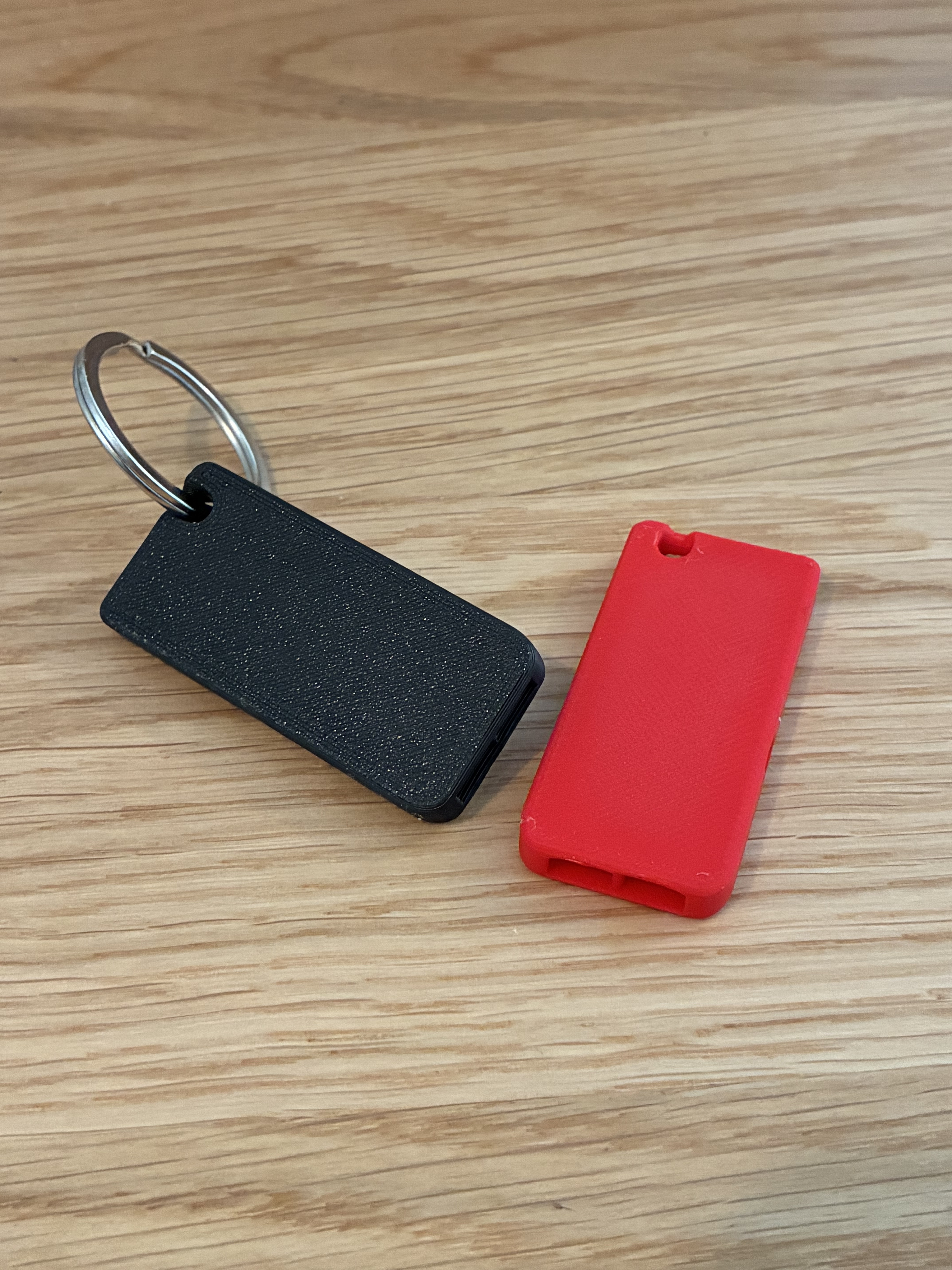 flat and loud emergency whistle up to 100 dB with keychain hole