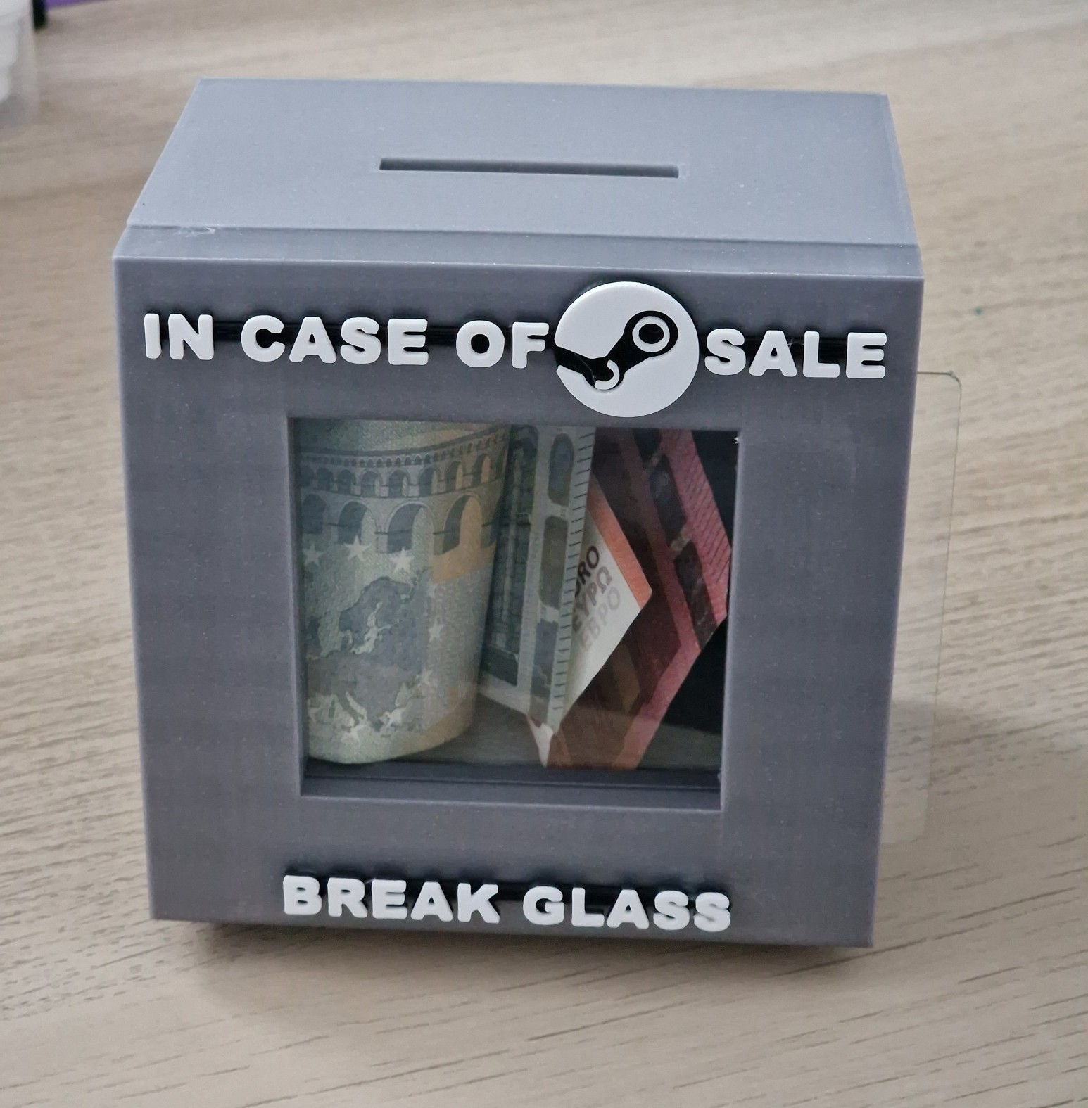 "In case of steam sale, break glass" piggy bank/gift box