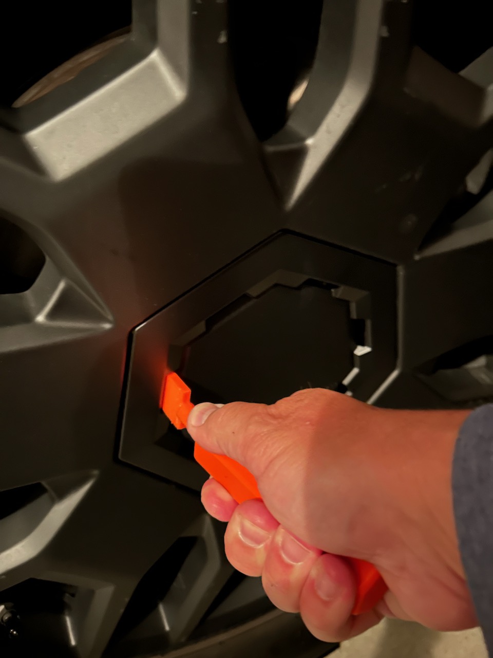 Tesla Cybertruck wheel cap puller