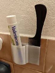 Držák na zubní pastu a hřeben