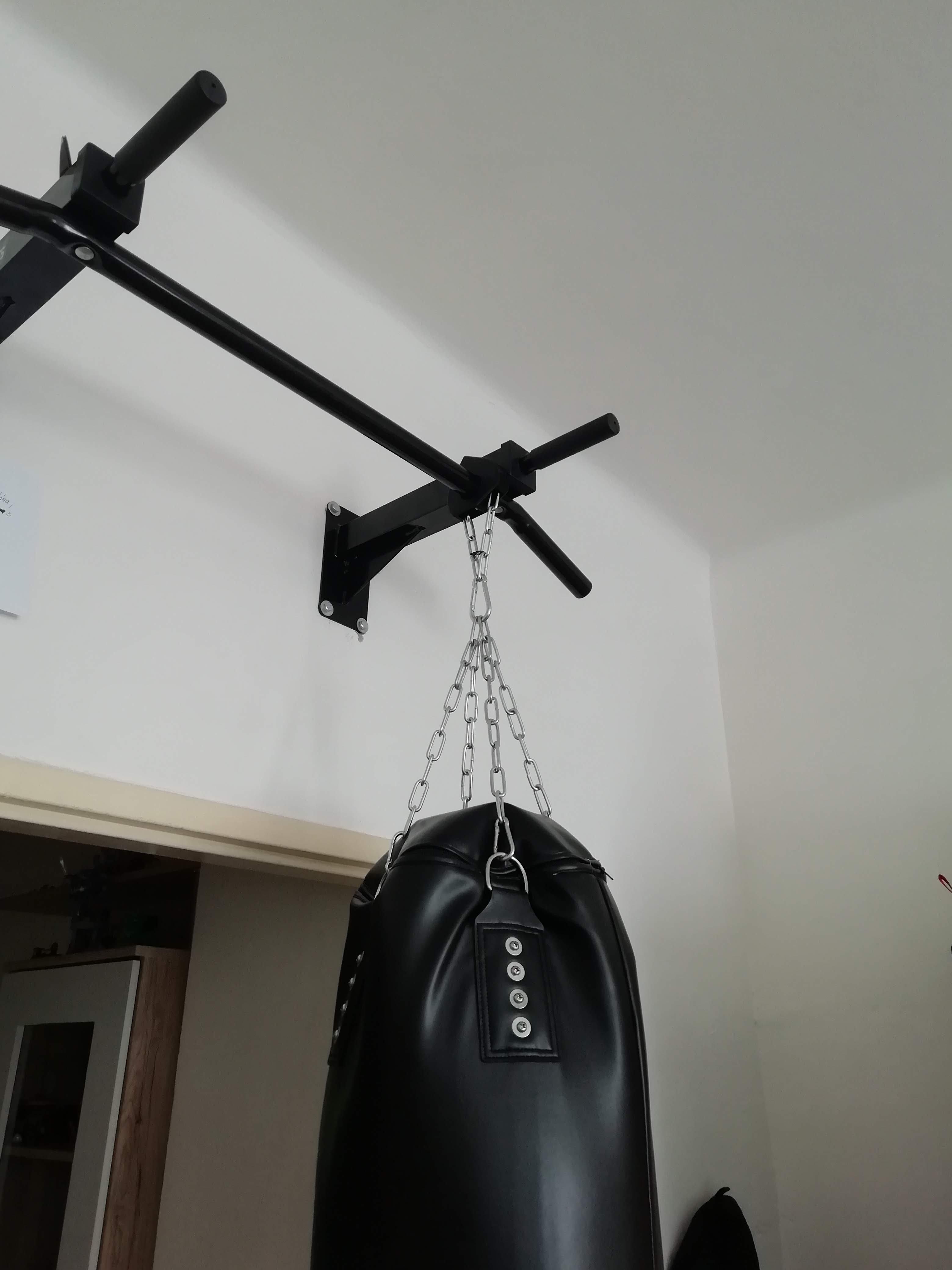 Boxing bag trapeze bar holder