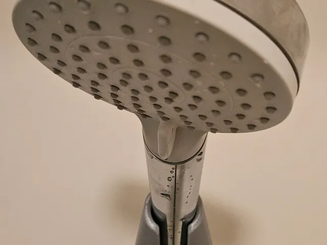 90° shower head holder