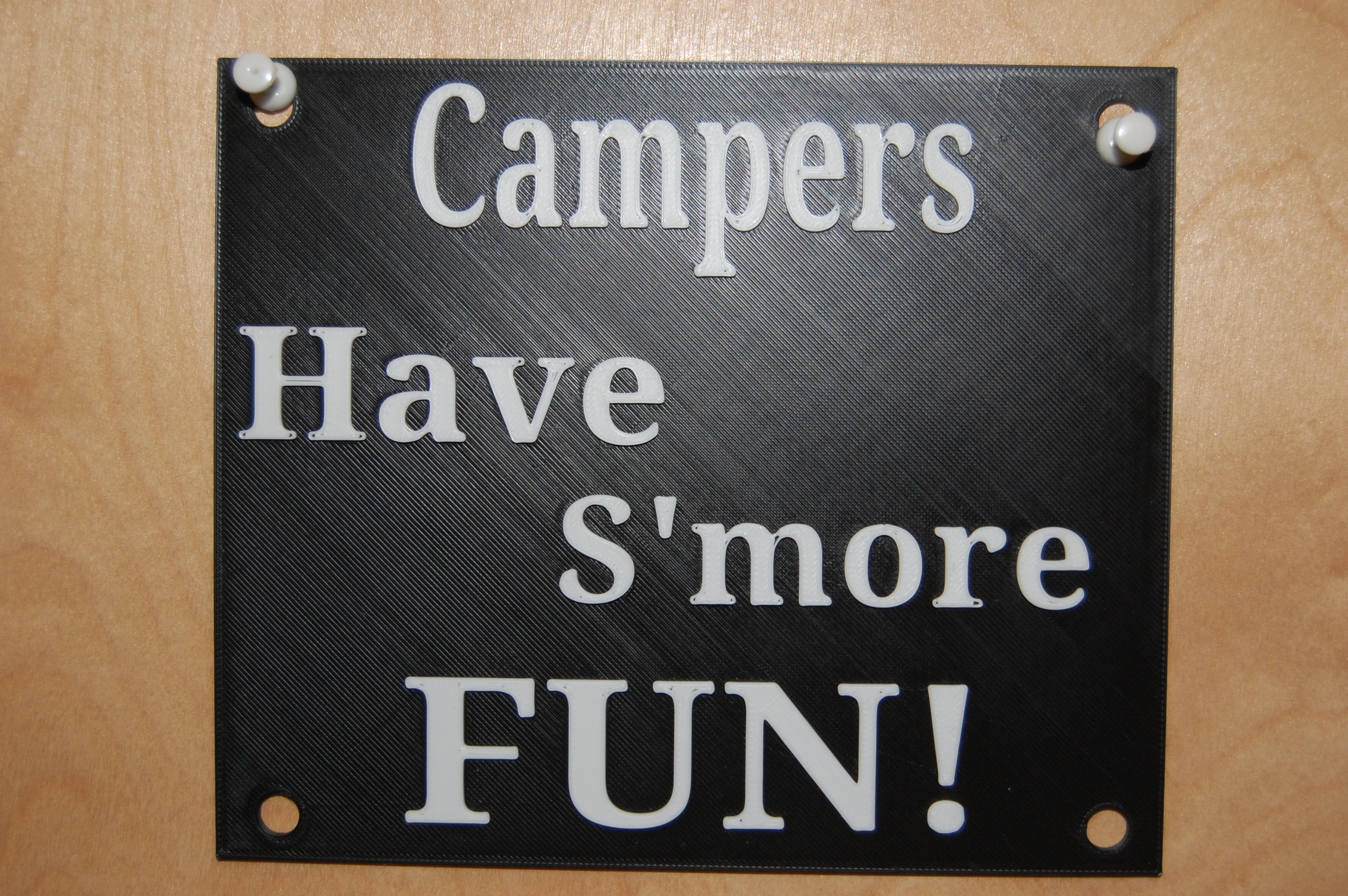 Campers have s'more fun sign