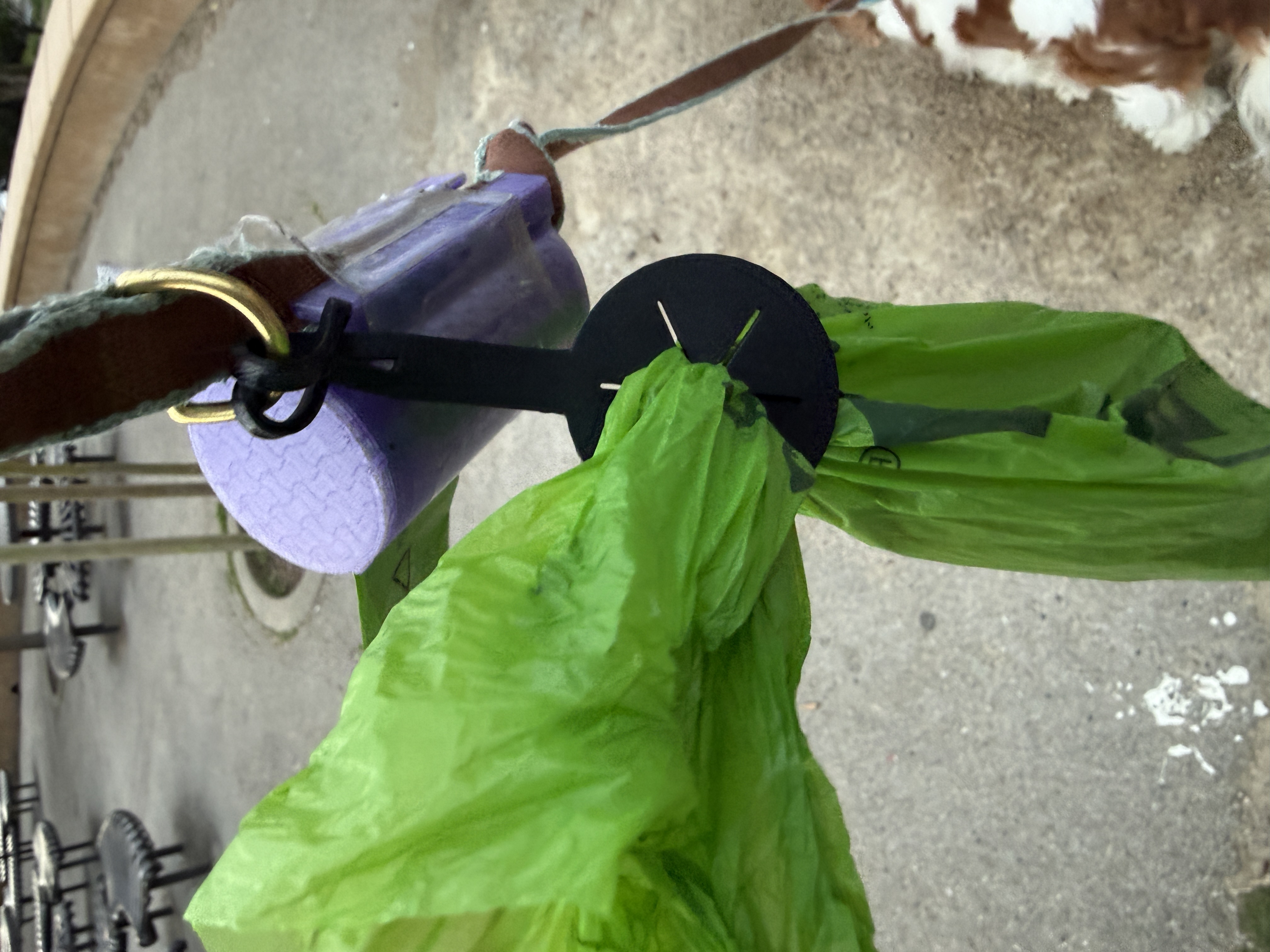 Used poop bag carrier