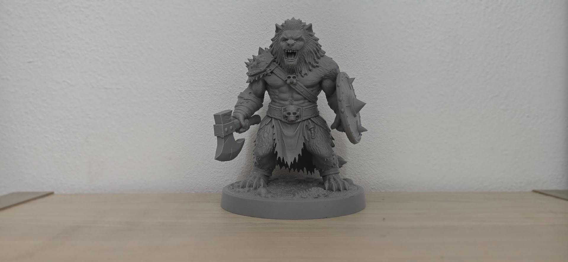 Lion Warrior with Axe and Spiked Shield Statue