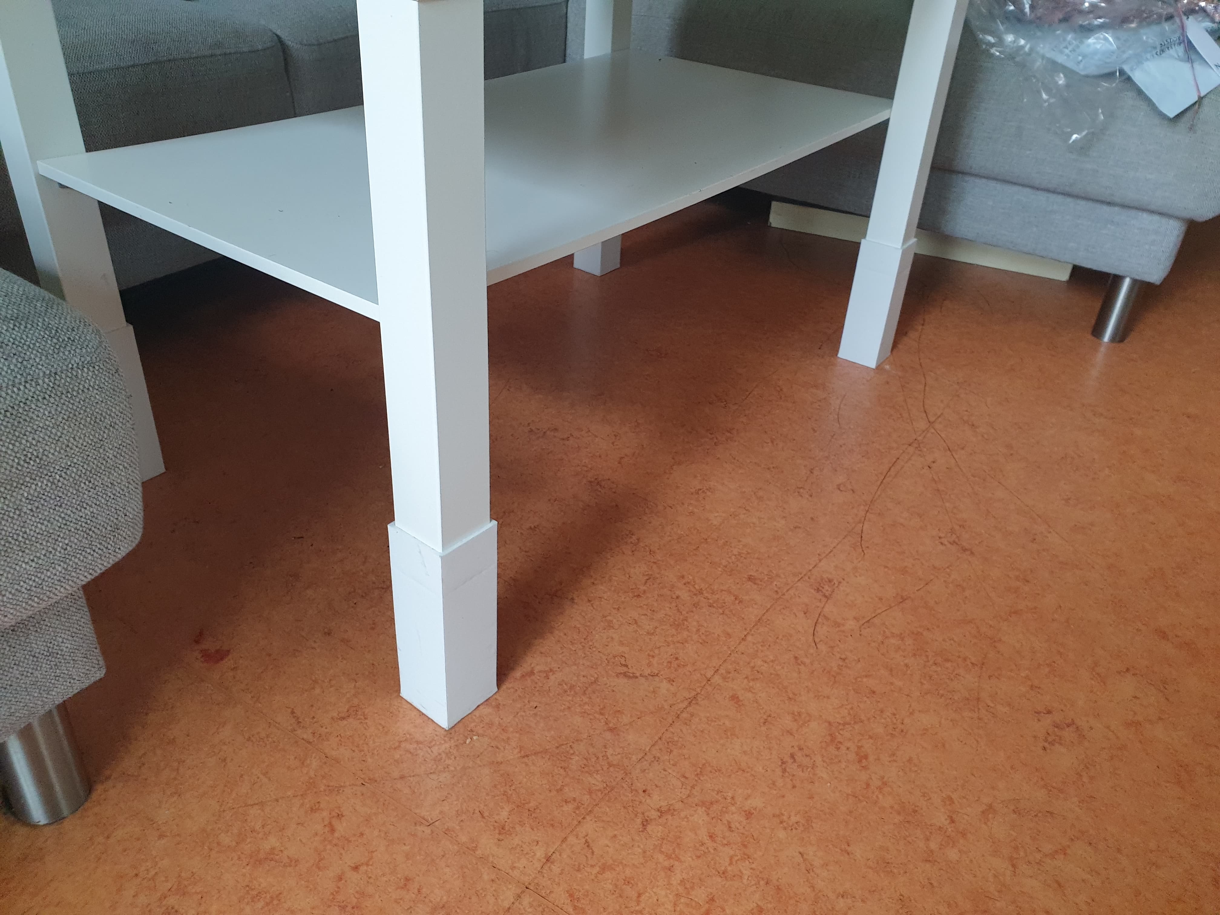 Height increase adapter for an IKEA LACK table