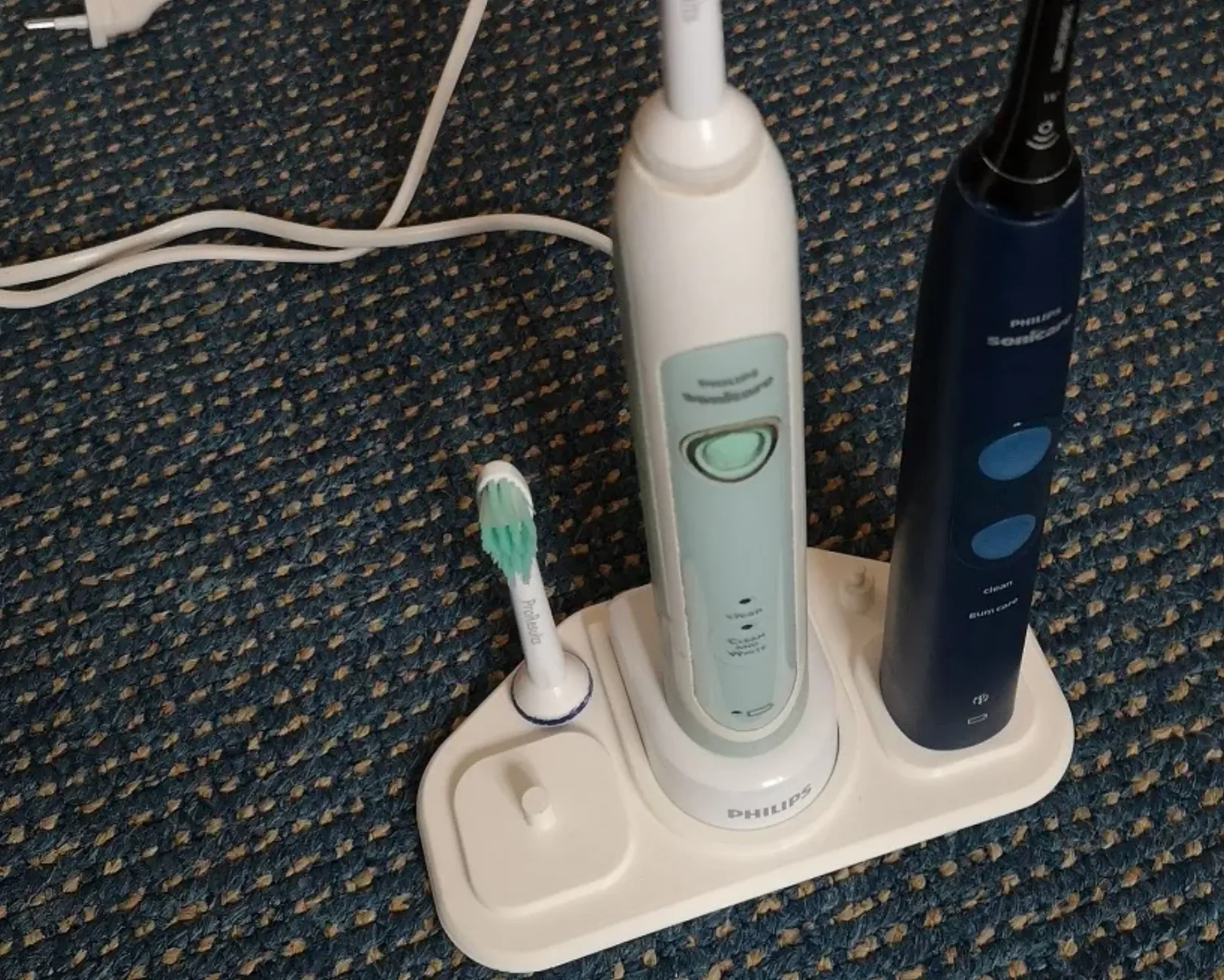 Philips Sonicare toothbrush holder; two versions