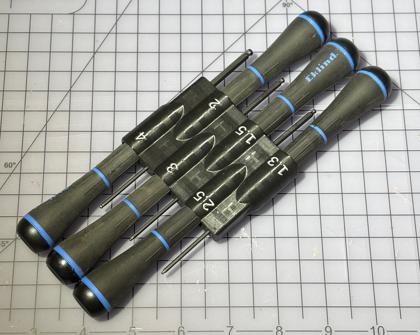 Eklind metric ball-hex driver holder compact with built-in retention springs - now including OpenSCAD file.